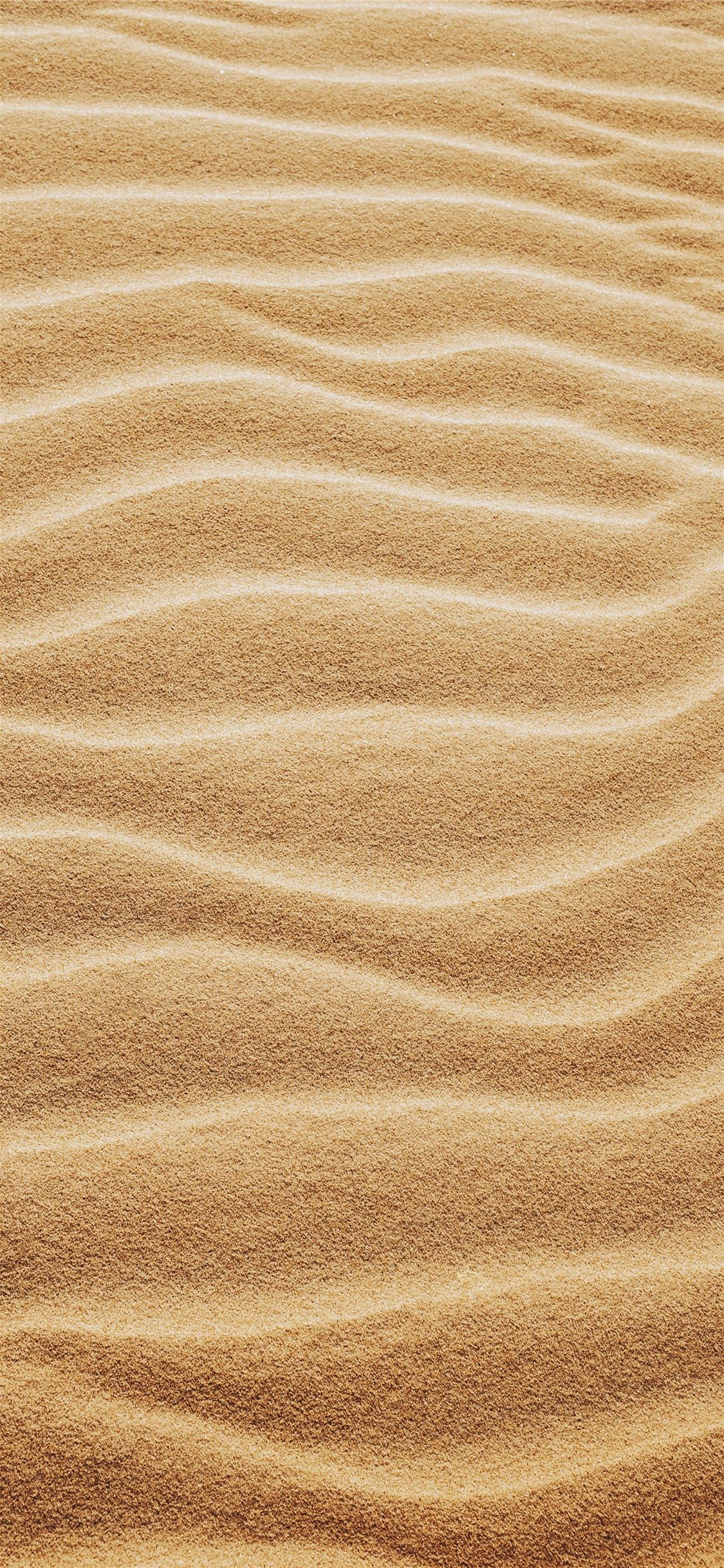 brown sand with shadow of person iPhone X Wallpaper Free Download