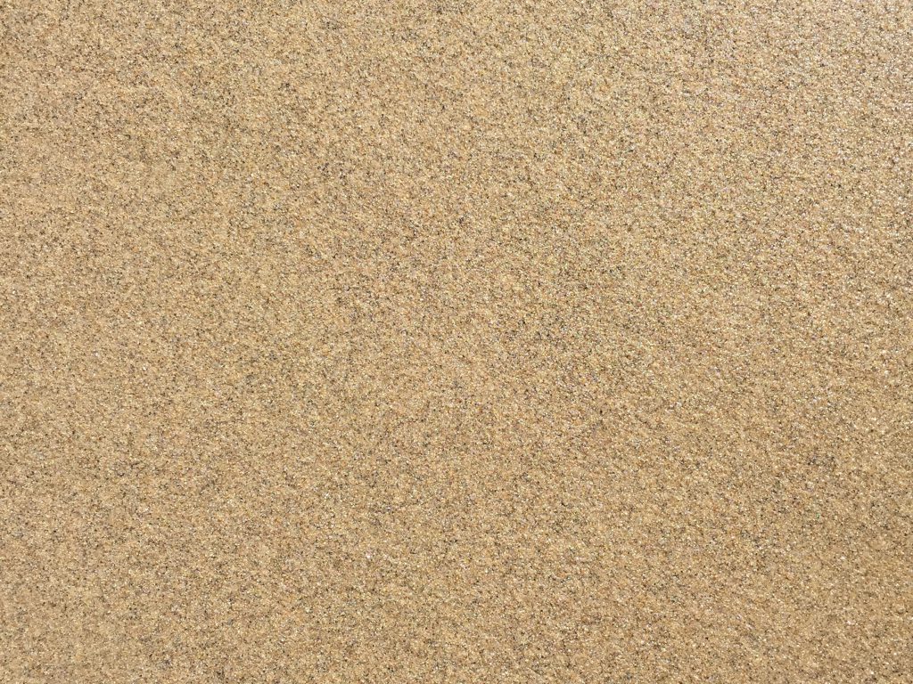 Beach sand wide shot with fine grains