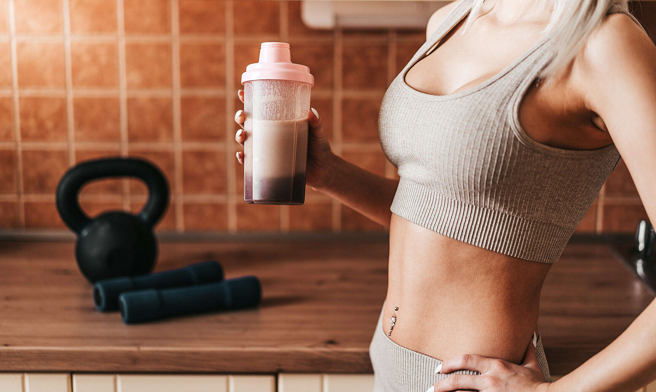 Fitness Woman is Drinking Protein Shake After Workout Free