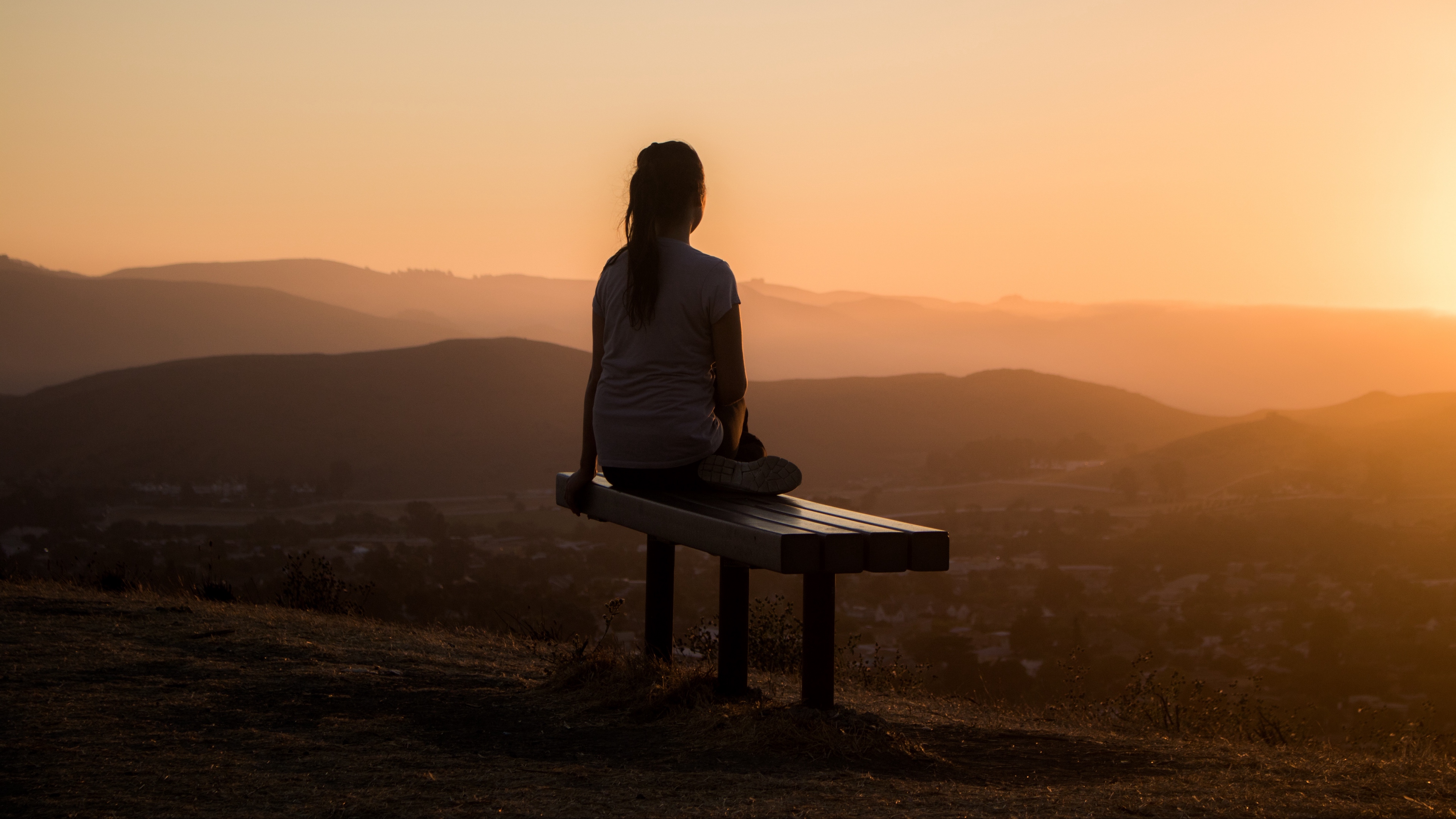 Wallpaper 4k bench, alone, solitude, sunset, mountains, girl 4k Wallpaper
