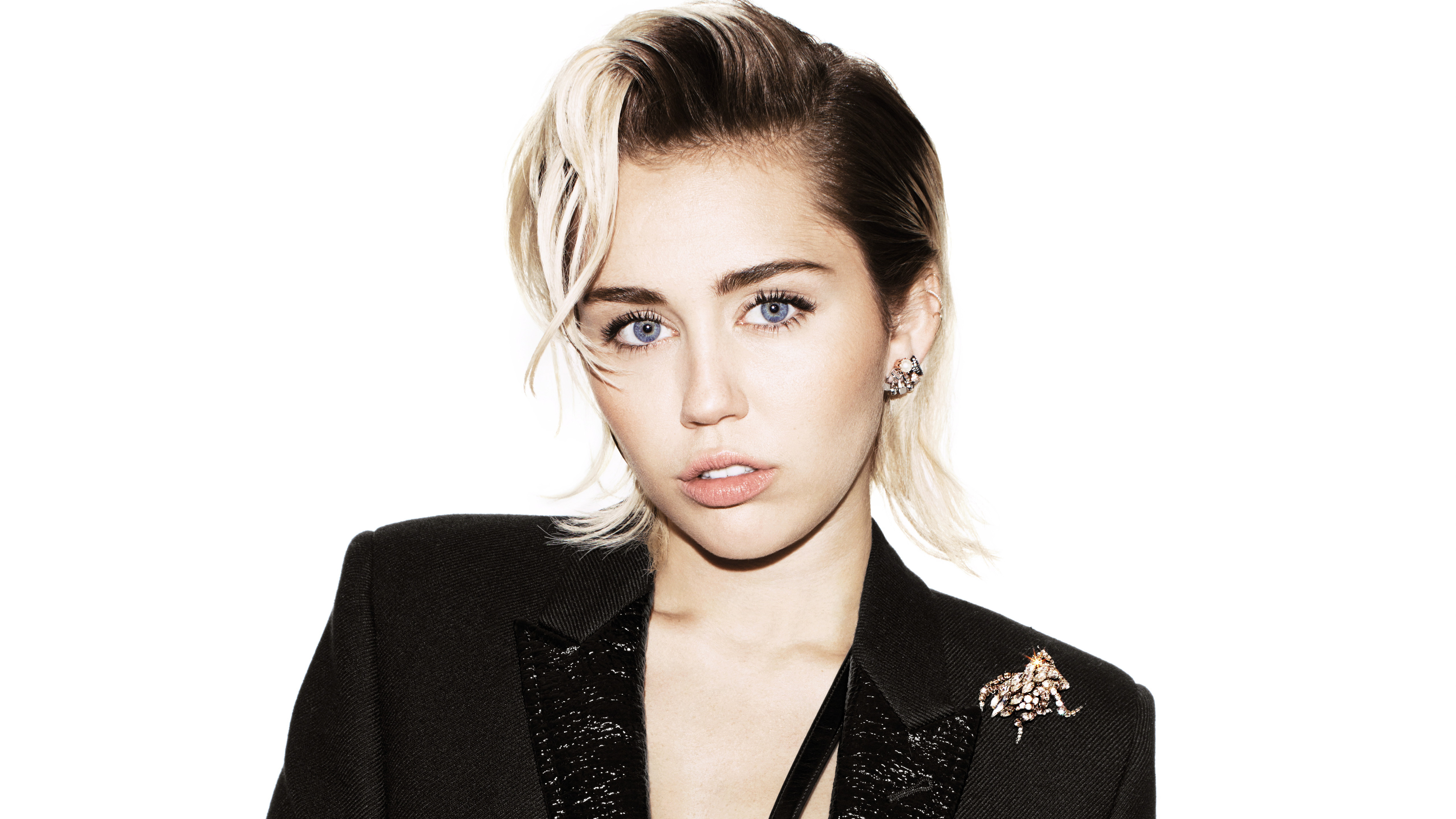 Miley 4K wallpaper for your desktop or mobile screen free and easy to download