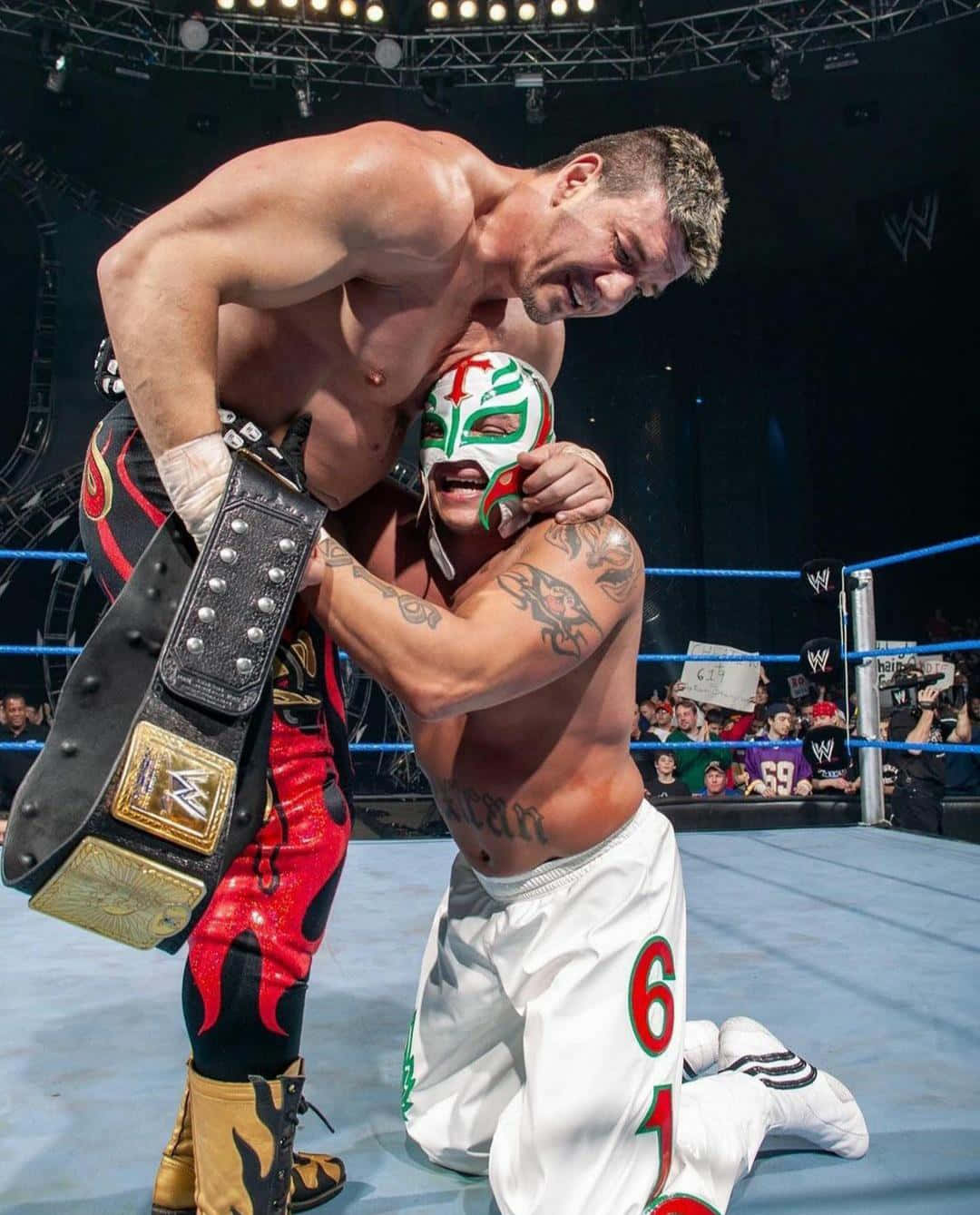 Download Eddie Guerrero Hugging Rey