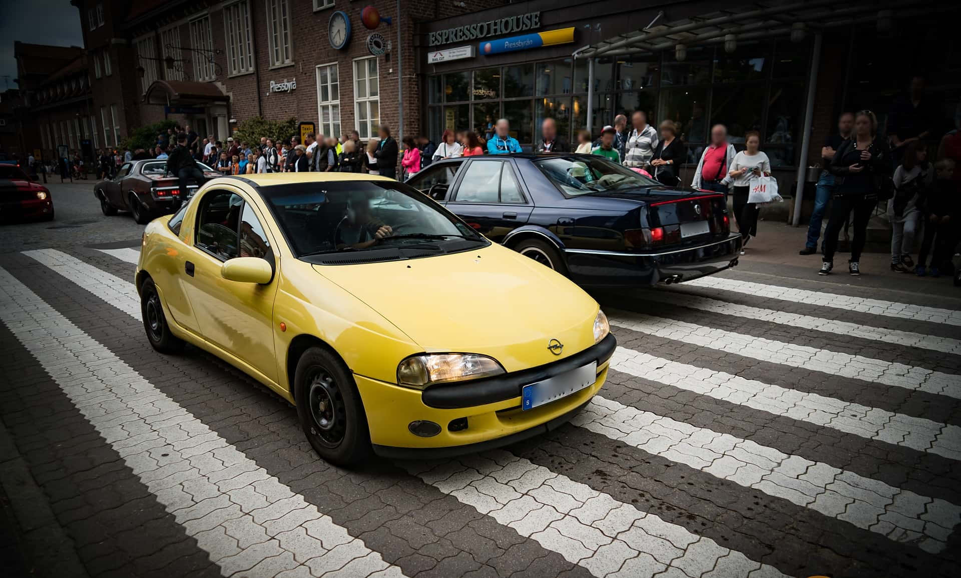 Download Opel Tigra In Motion On A Scenic Route. Wallpaper