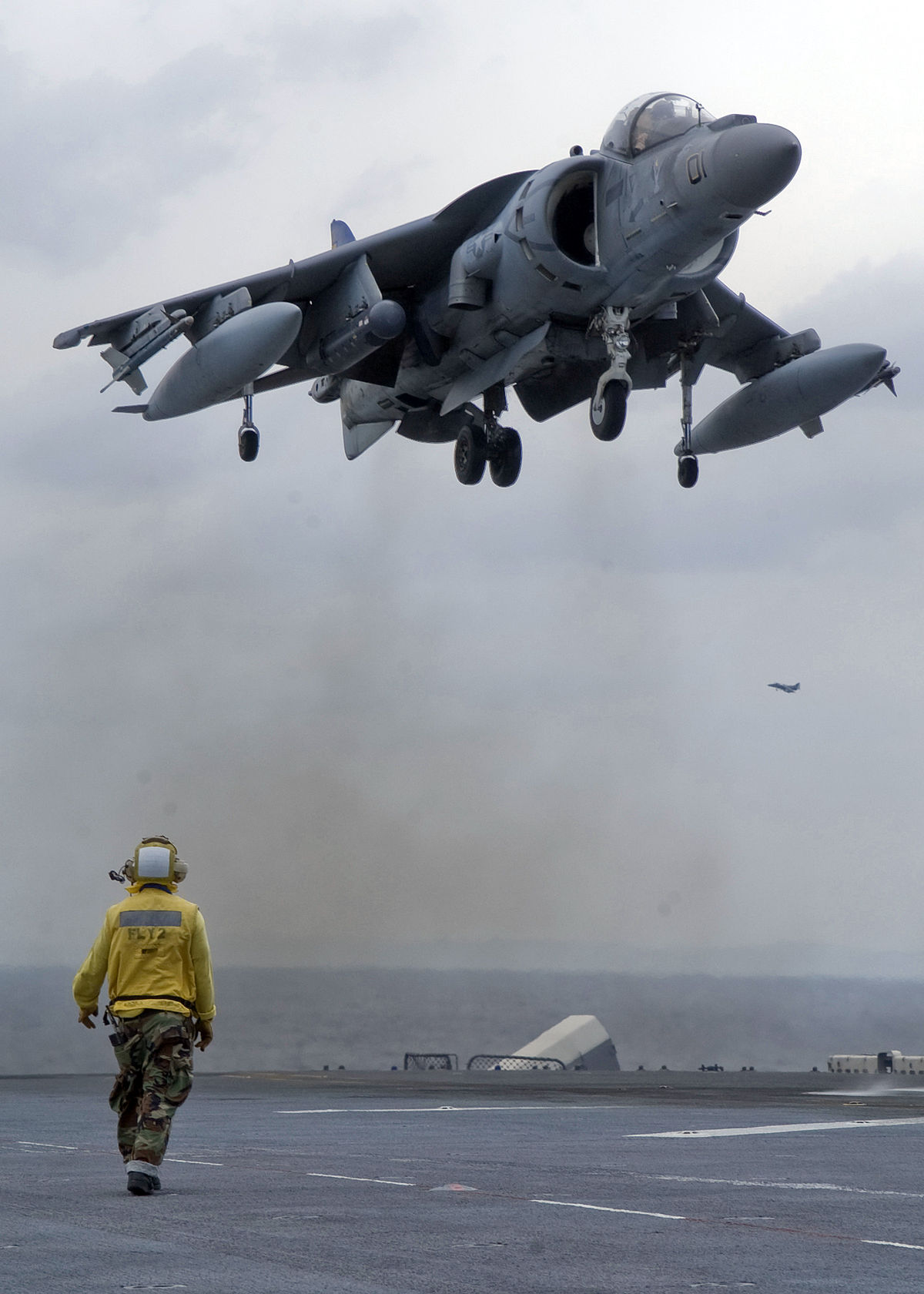 AV 8B Harrier II Landing On USS Essex ID 080429 N 5253W