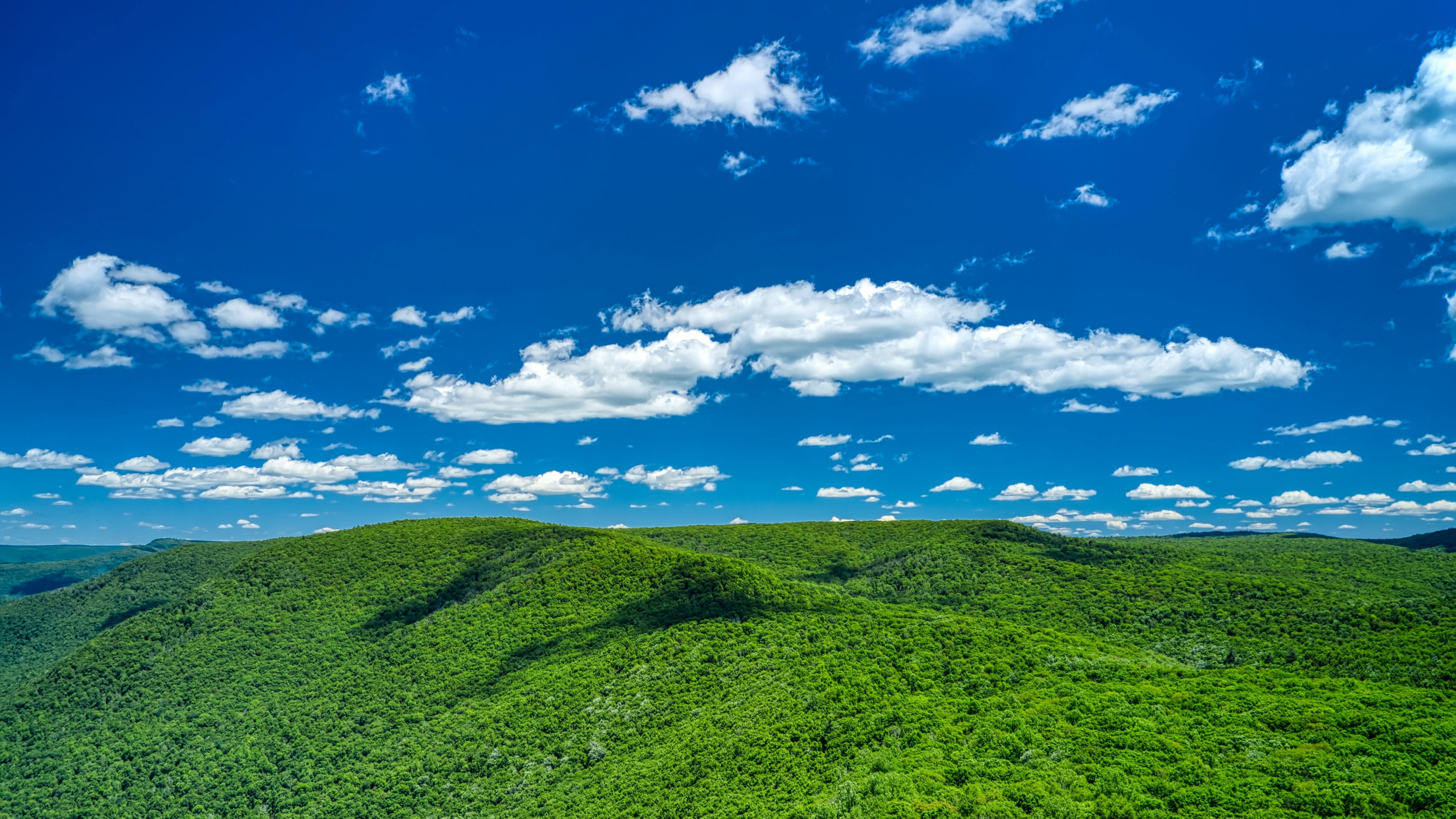 Download wallpaper 3840x2160 hills, landscape, white clouds, sunny sky 4k wallpaper, uhd wallpaper, 16:9 widescreen 3840x2160 HD background, 25149