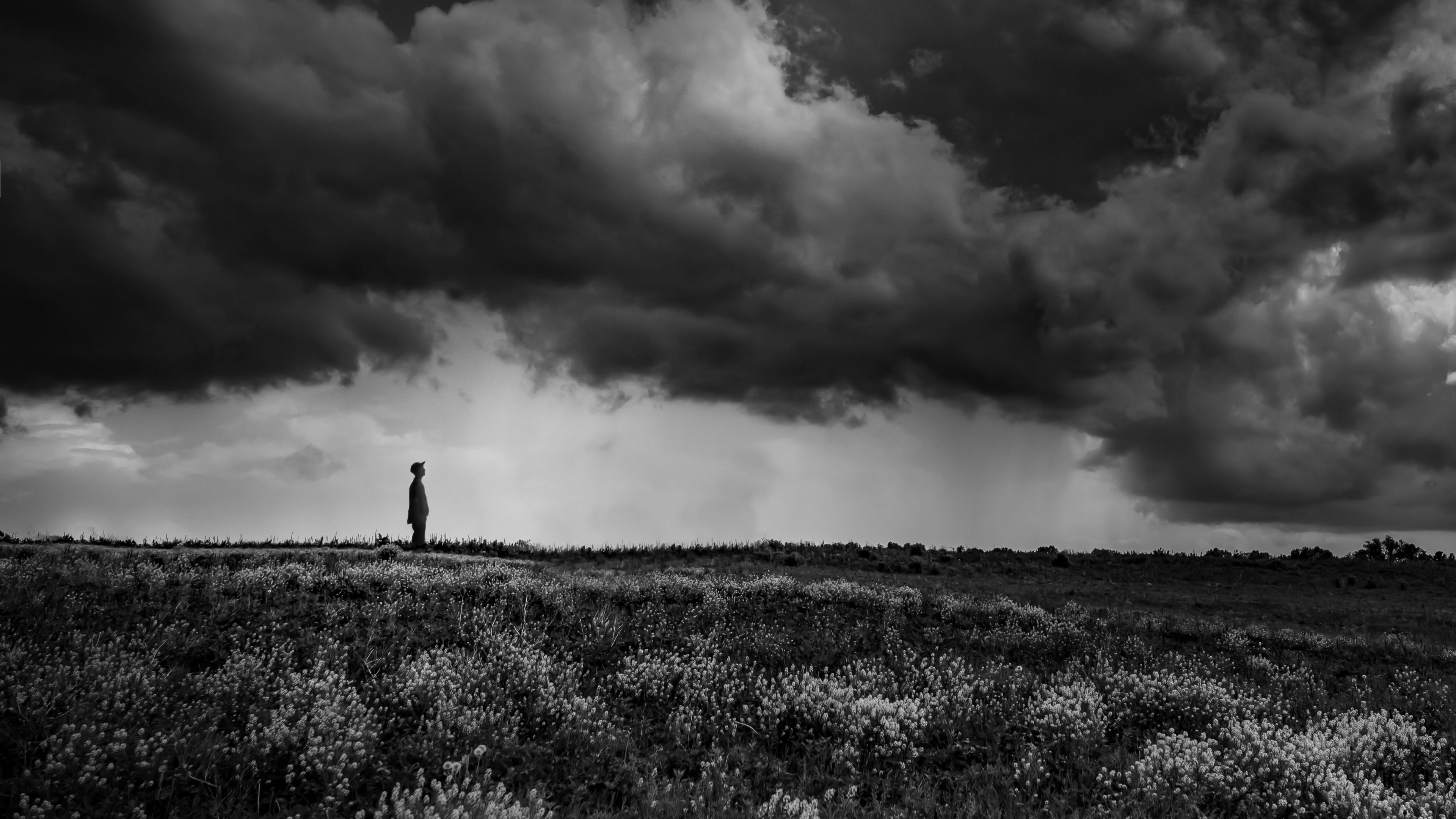 Download wallpaper 3840x2160 loneliness, alone, sad, bw, vast 4k uhd 16:9 HD background