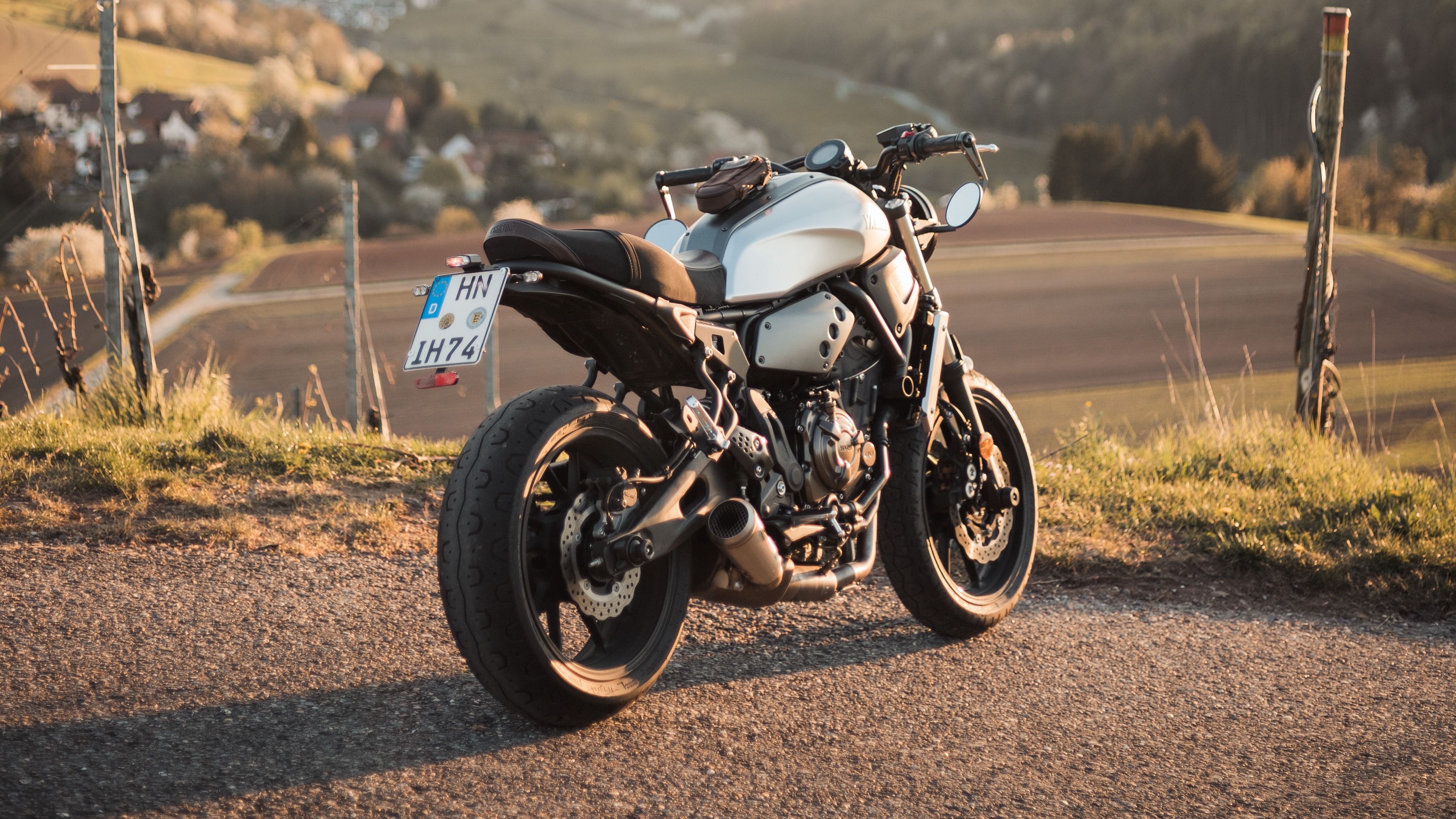 Download wallpaper 3840x2160 motorcycle, rear view, wheels, motor 4k uhd 16:9 HD background