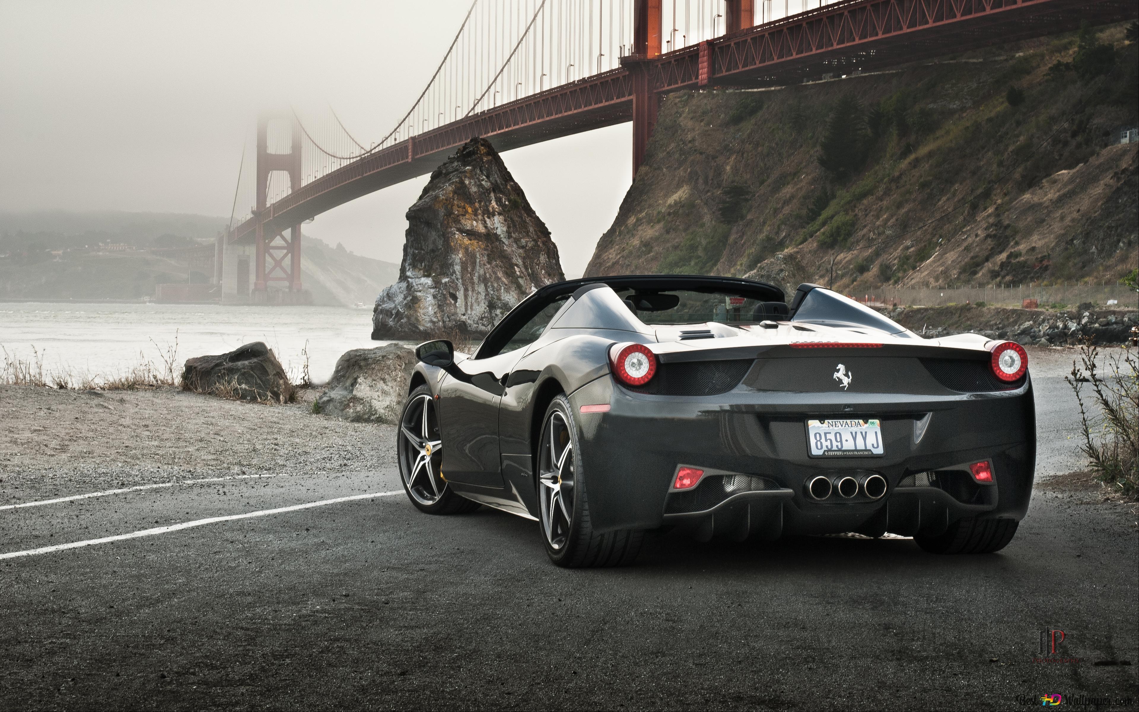 Black Ferrari 458 Spider below the Golden Gate Bridge 4K wallpaper download