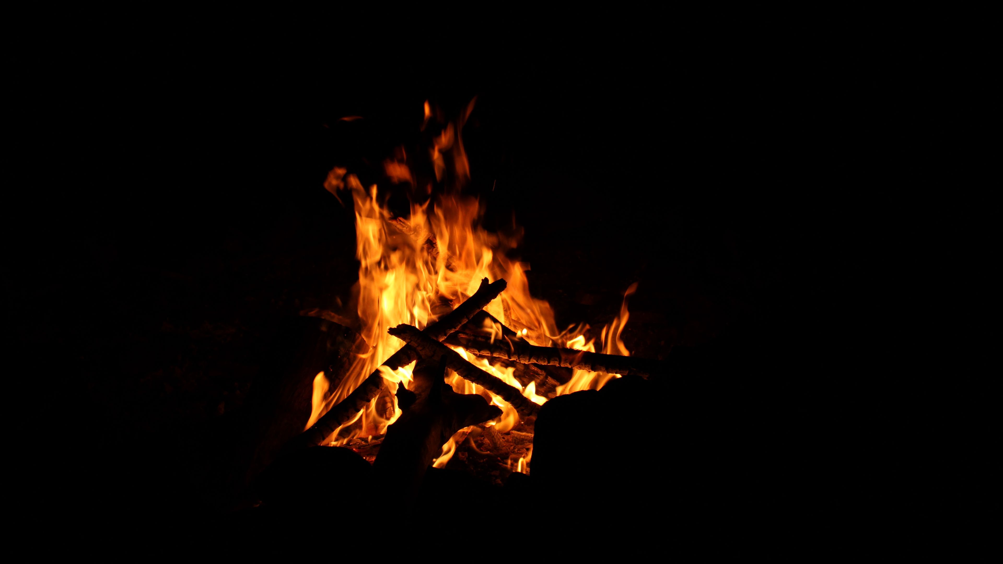 Download wallpaper 3840x2160 fire, firewood, flame, bonfire, night 4k uhd 16:9 HD background