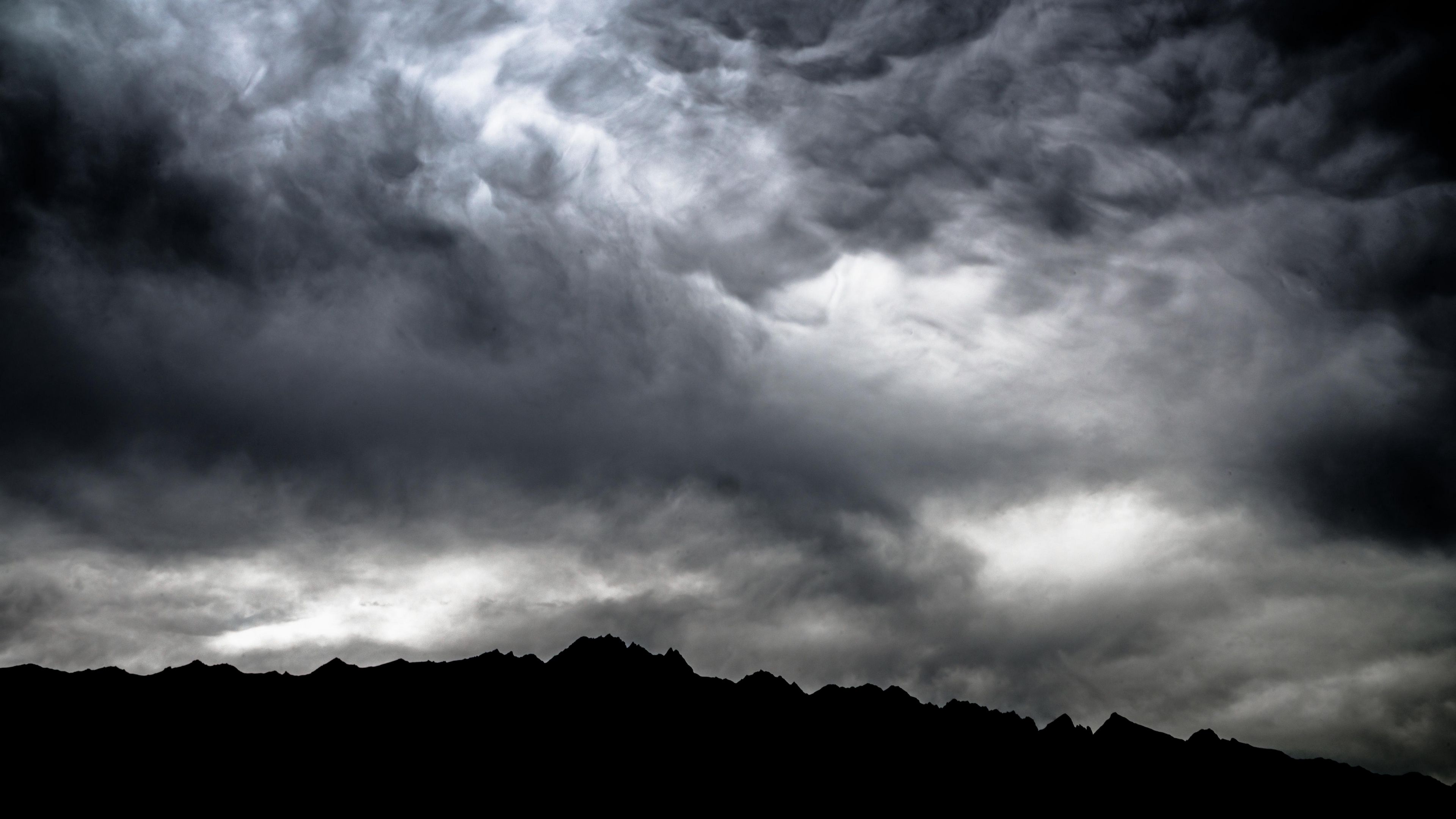 Wallpaper / mountains, clouds, dark, dusk, storm, 4k free download