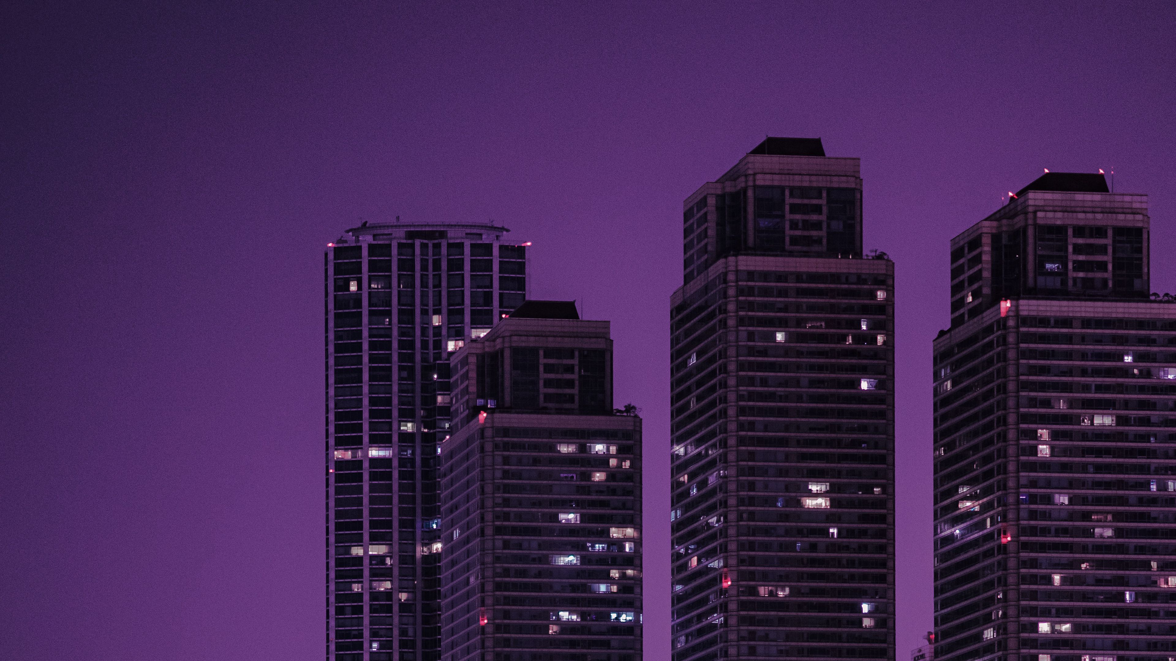 Download wallpaper 3840x2160 skyscrapers, buildings, city, night, dark, purple 4k uhd 16:9 HD background