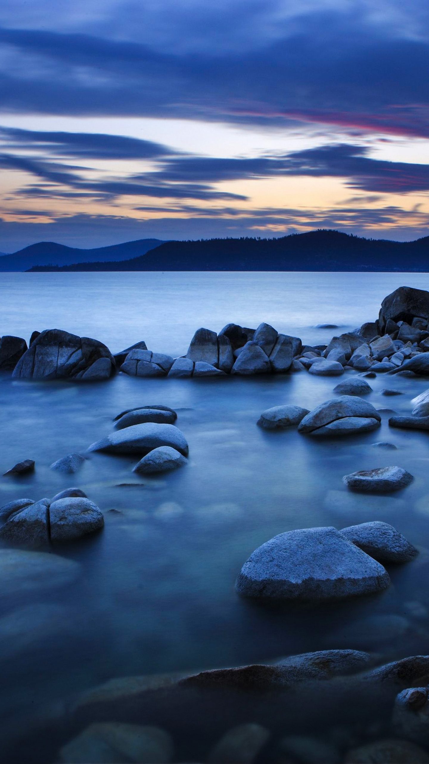 Rocks Lake Sea Blue Sky Clouds 4K Wallpaper