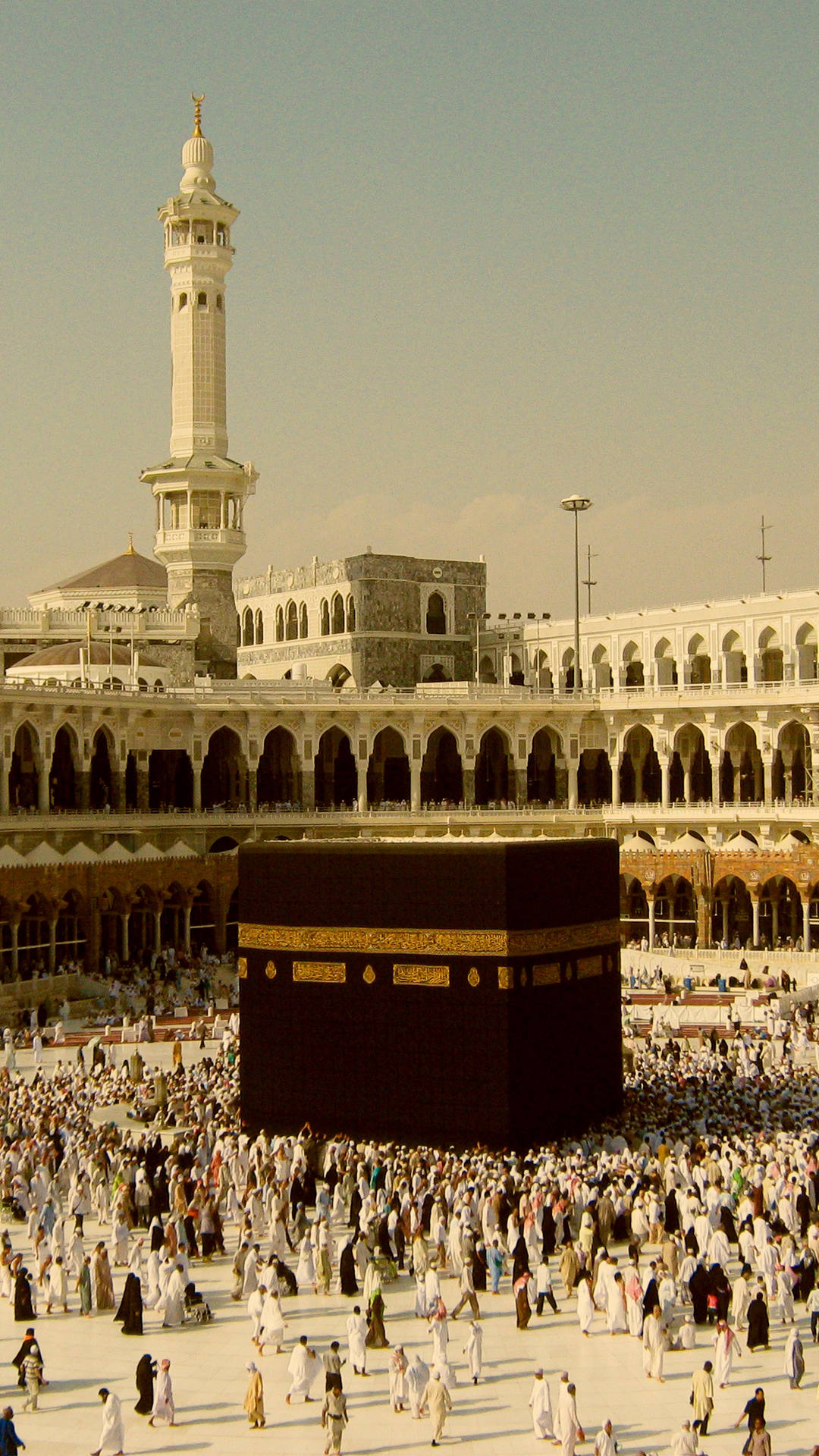 Download Pilgrims Gathered Around the Sacred Kaaba Wallpaper