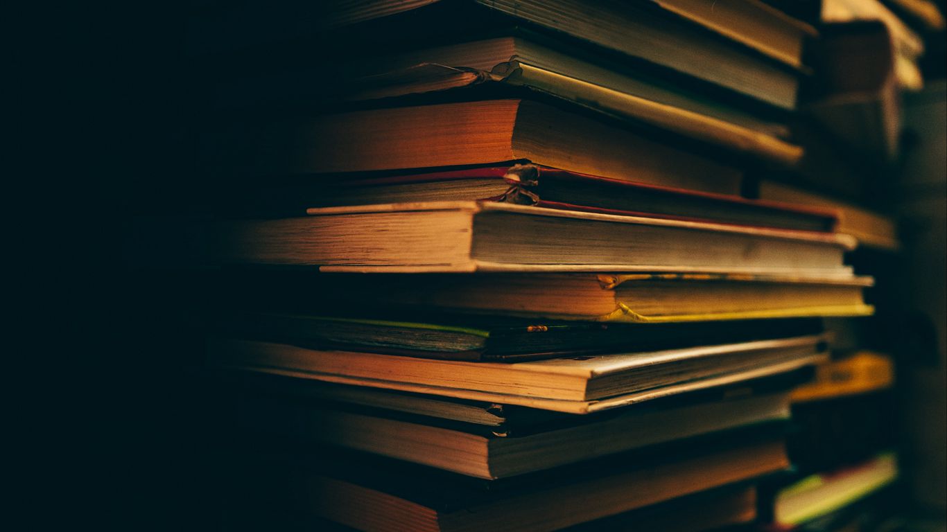 Download wallpaper 1366x768 books, dark, shelf, library tablet, laptop HD background