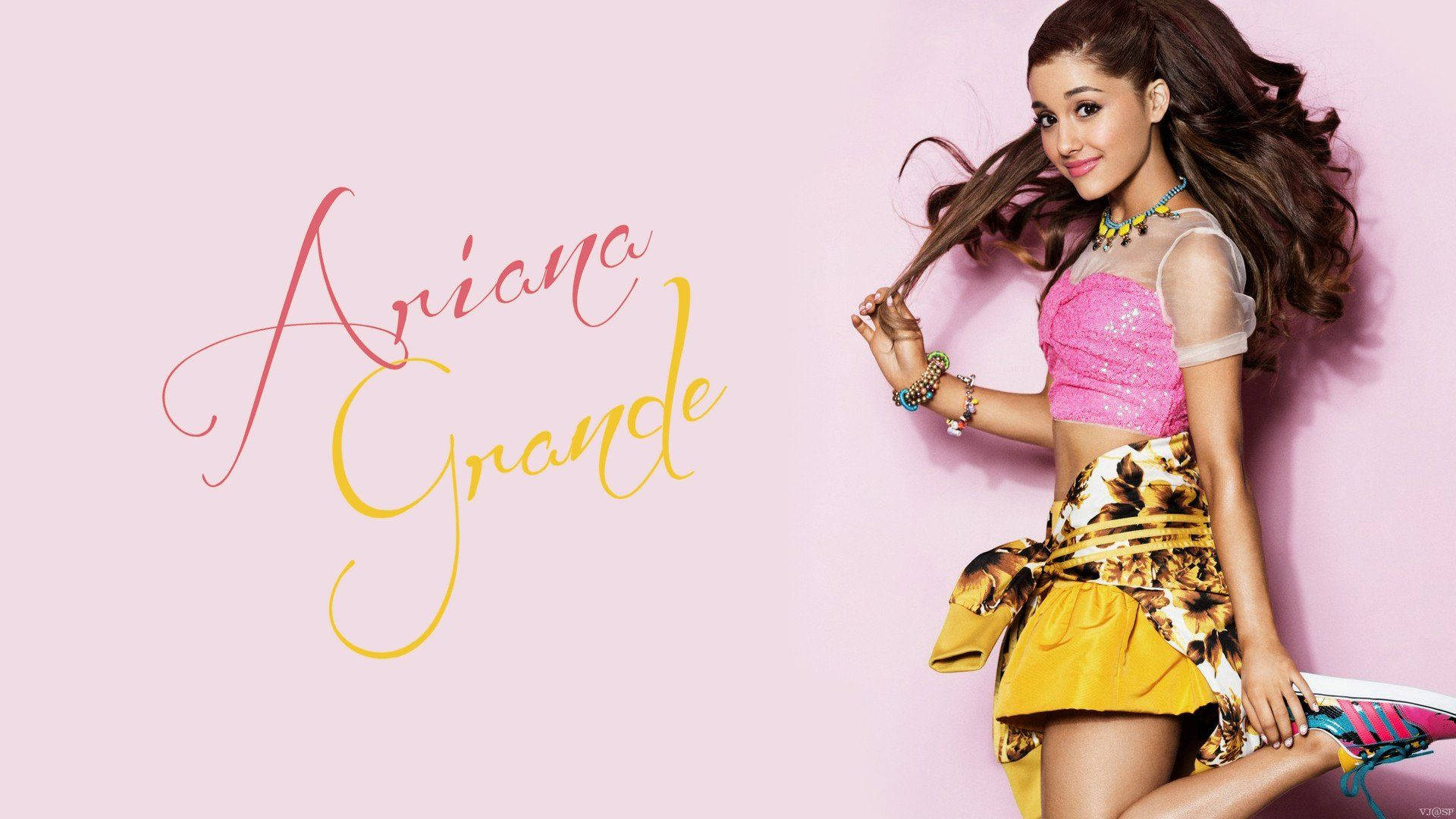 Download Singer and songwriter Ariana Grande brings her bright and upbeat energy to life. Wallpaper