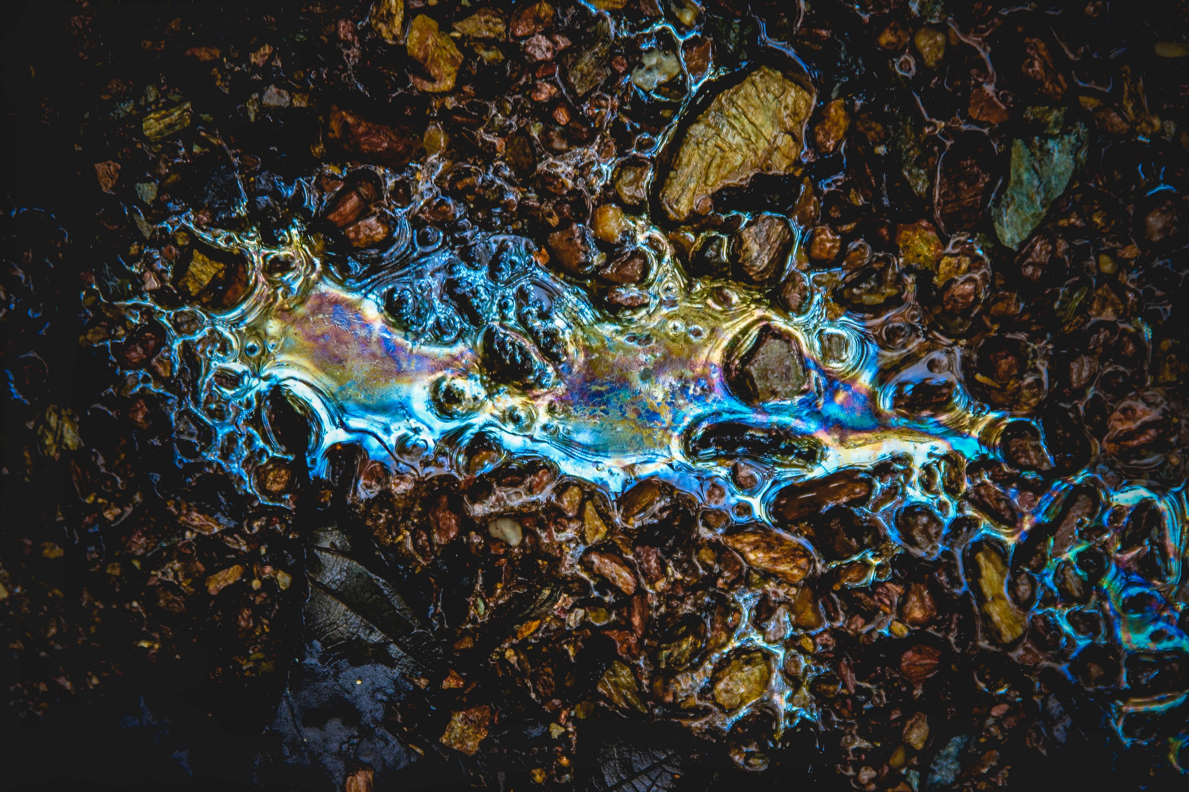 Wallpaper / oil spill spill oil and rock HD 4k wallpaper free download