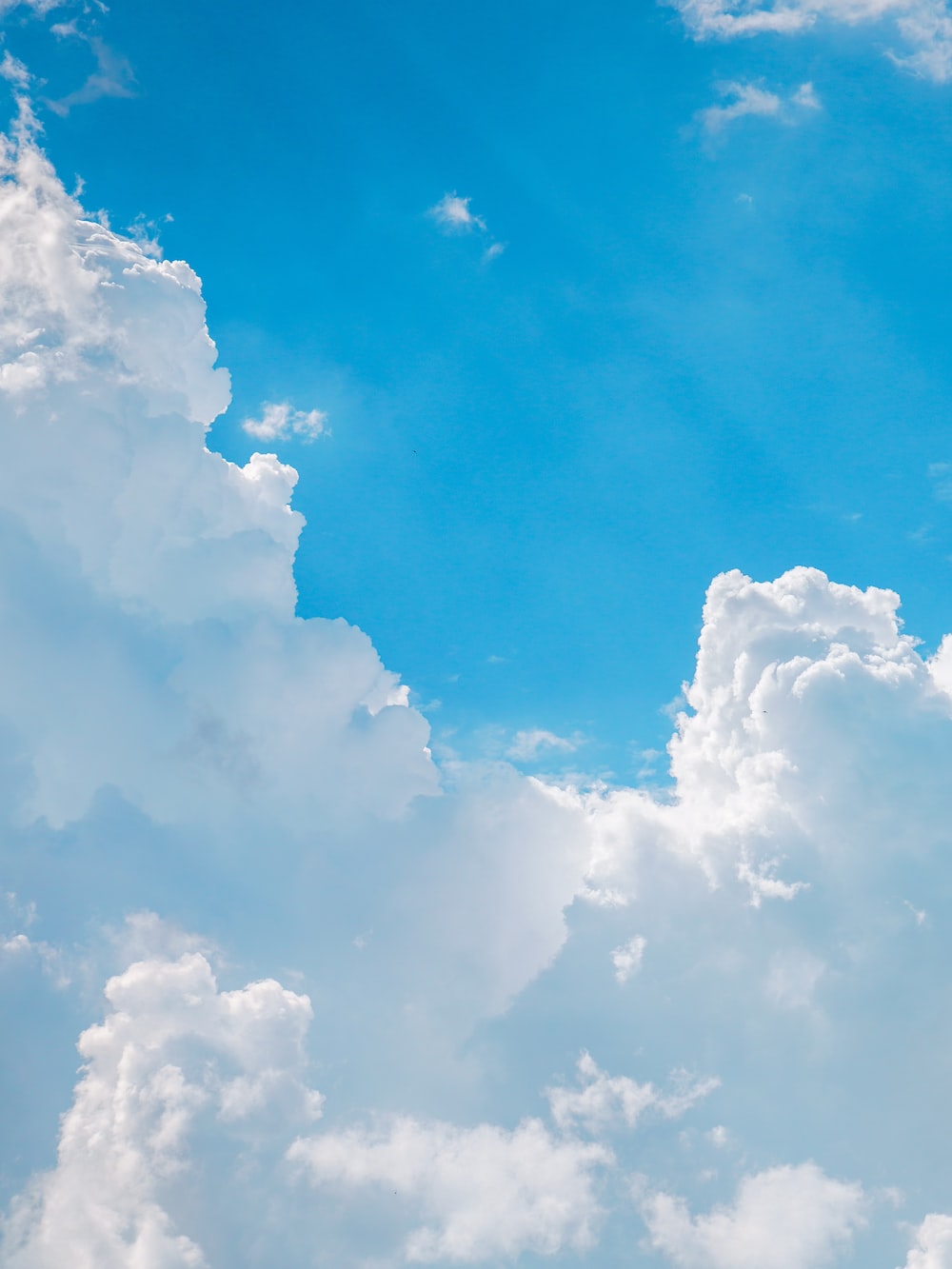 White clouds and blue sky during daytime photo
