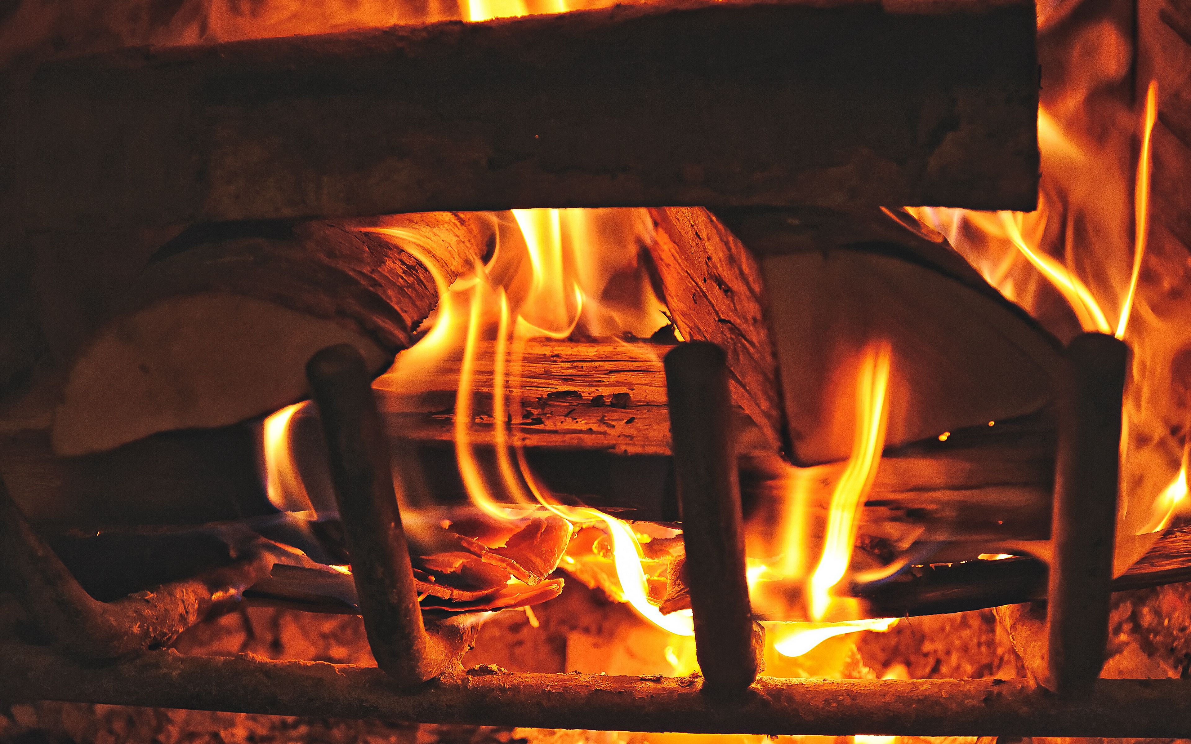 Download wallpaper 3840x2400 fireplace, fire, firewood 4k ultra HD 16:10 HD background