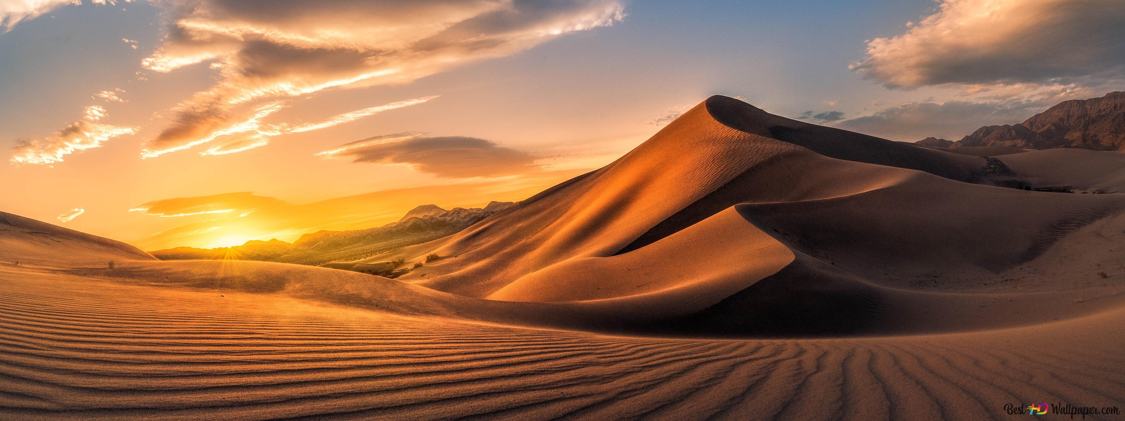 Desert sands in cloudy and sunny weather 4K wallpaper download