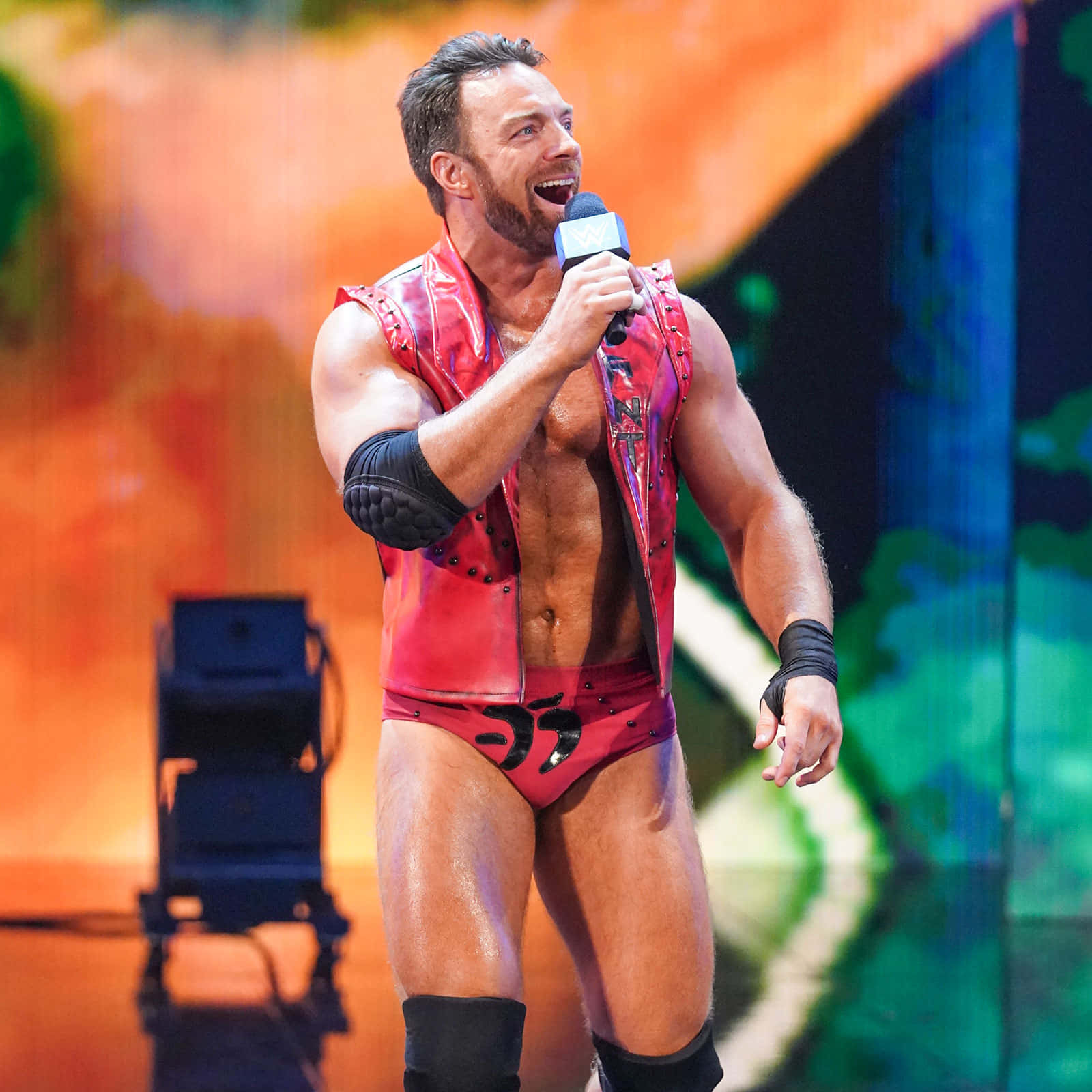 Download LA Knight Engages in WWE Friday Night Smackdown Discussion Wallpaper