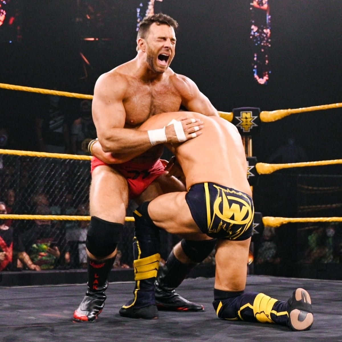 Download La Knight Vs. Johnny Gargano Wwe Match Wallpaper