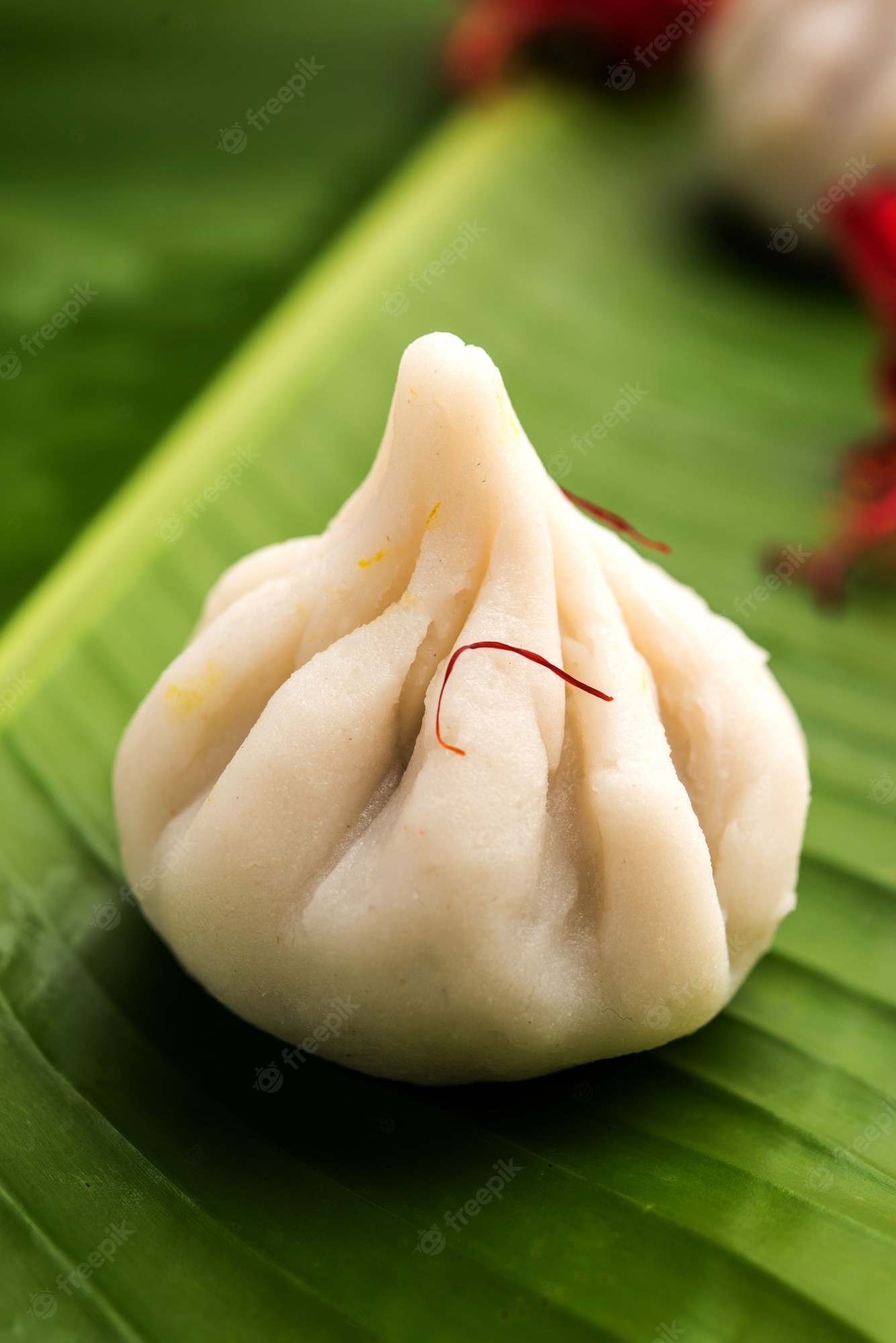 Premium Photo. Ukdiche Modak Are Steamed Dumplings With An Outer Rice Flour Dough And A Coconut Jaggery Stuffing, Indian Food Offered To Lord Ganesha On Chaturthi
