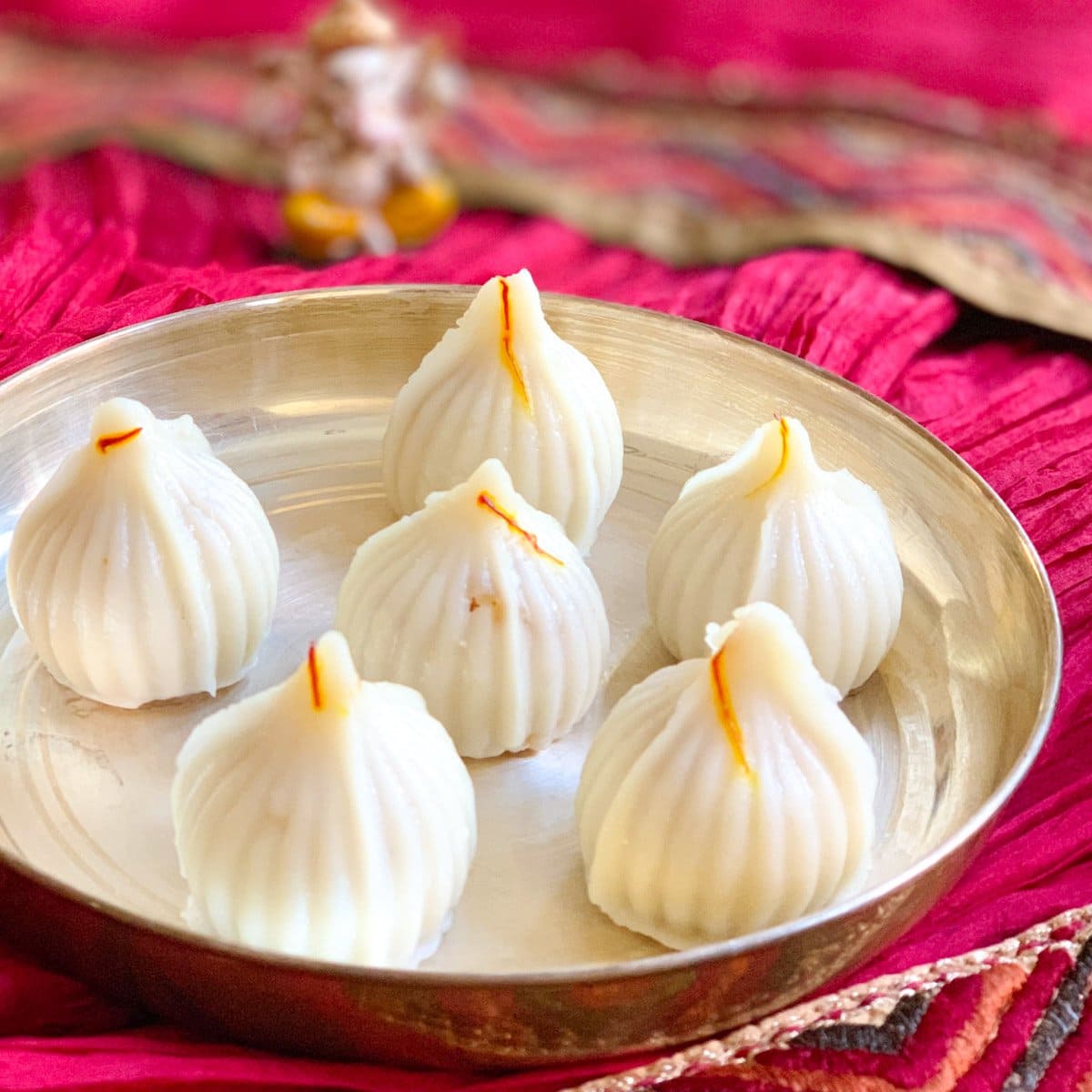 Ukadiche Modak (Steamed rice dumplings with sweet coconut filling) Pot Curry