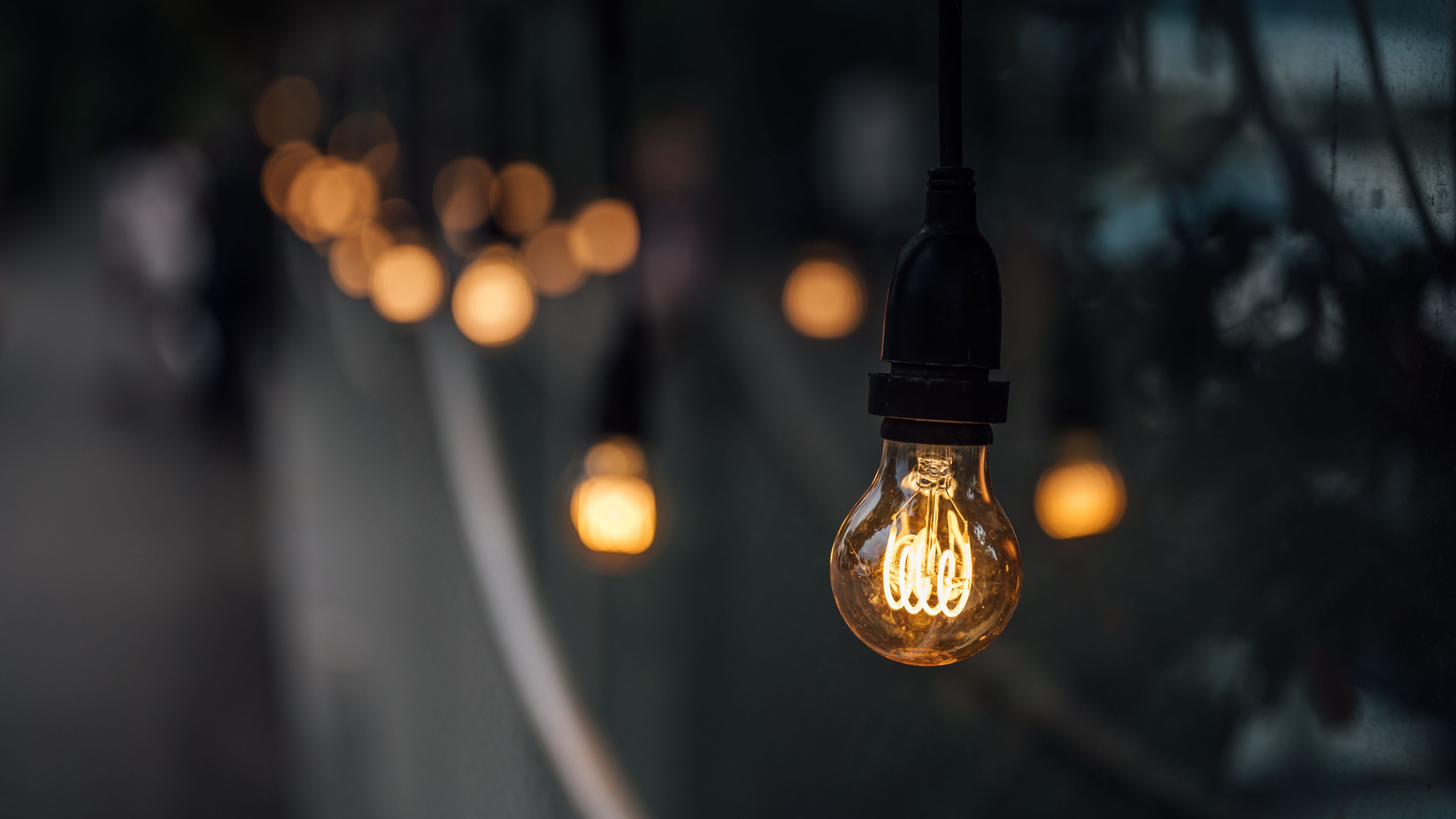 Download wallpaper 3840x2160 light bulb, electricity, light, glare, dark 4k uhd 16:9 HD background