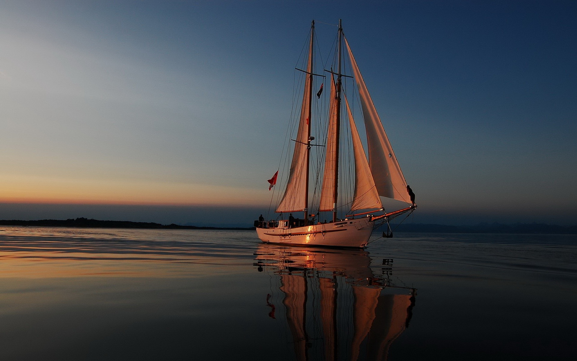 Serene Sailboat at Sunset