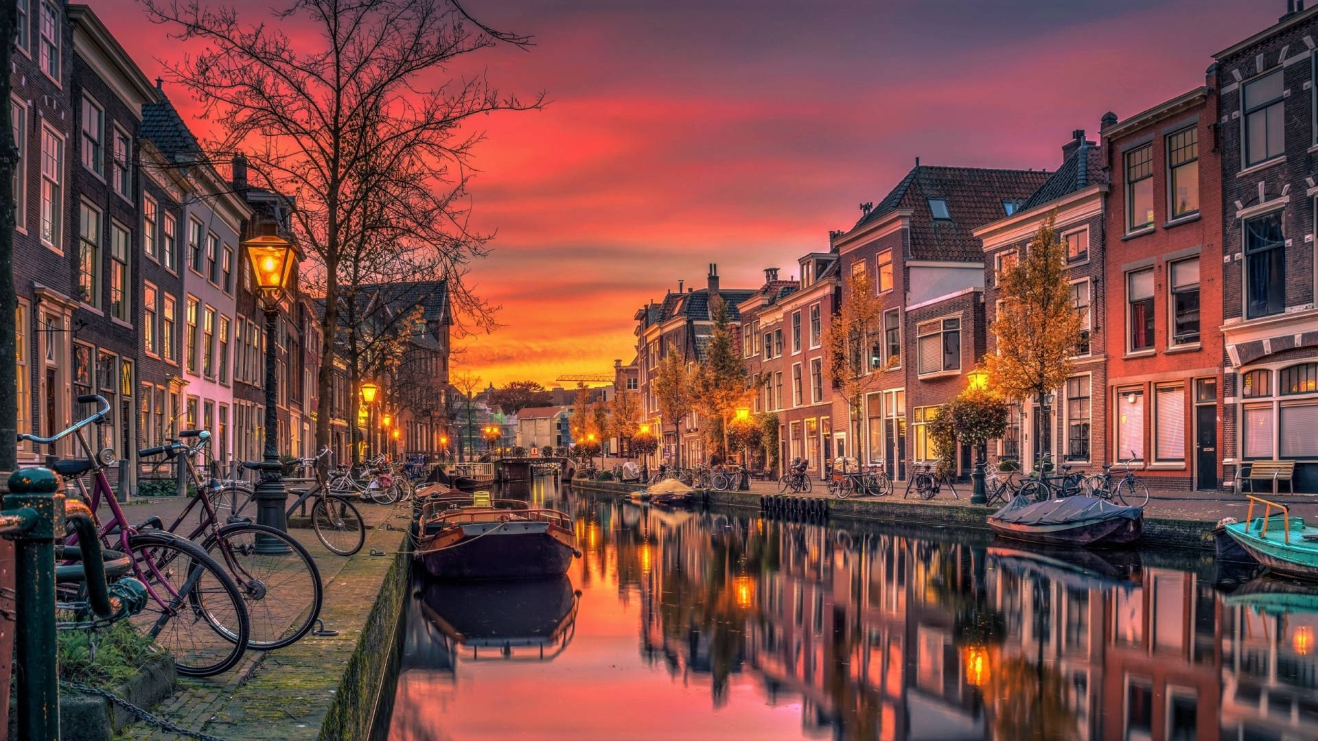 Download Red Sunset At Amsterdam Canal Wallpaper
