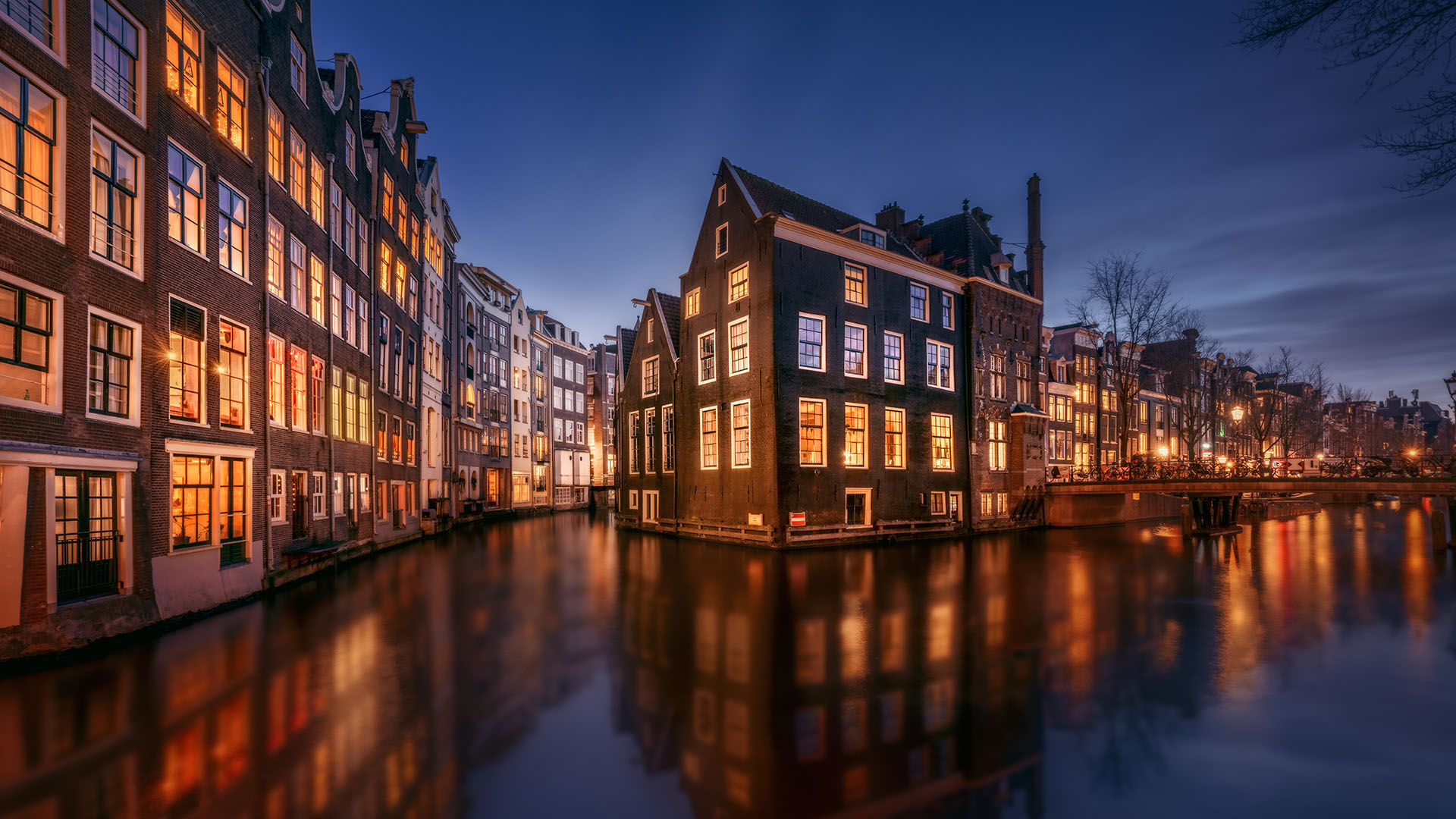 Amsterdam tranquil canal scene with canal houses by night, Netherlands. Windows Spotlight Image