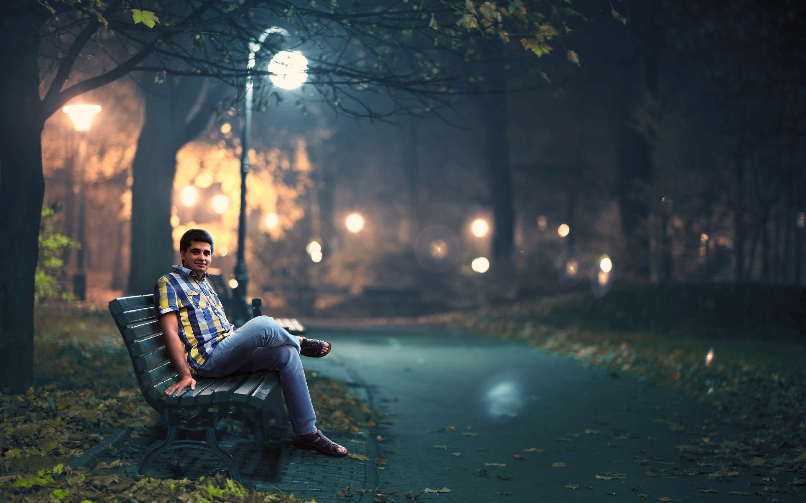 adult, bench, blur, city, fog, light, man, mist, night, outdoors, park, pathway, sitting, street, street lamps, trees wallpaper