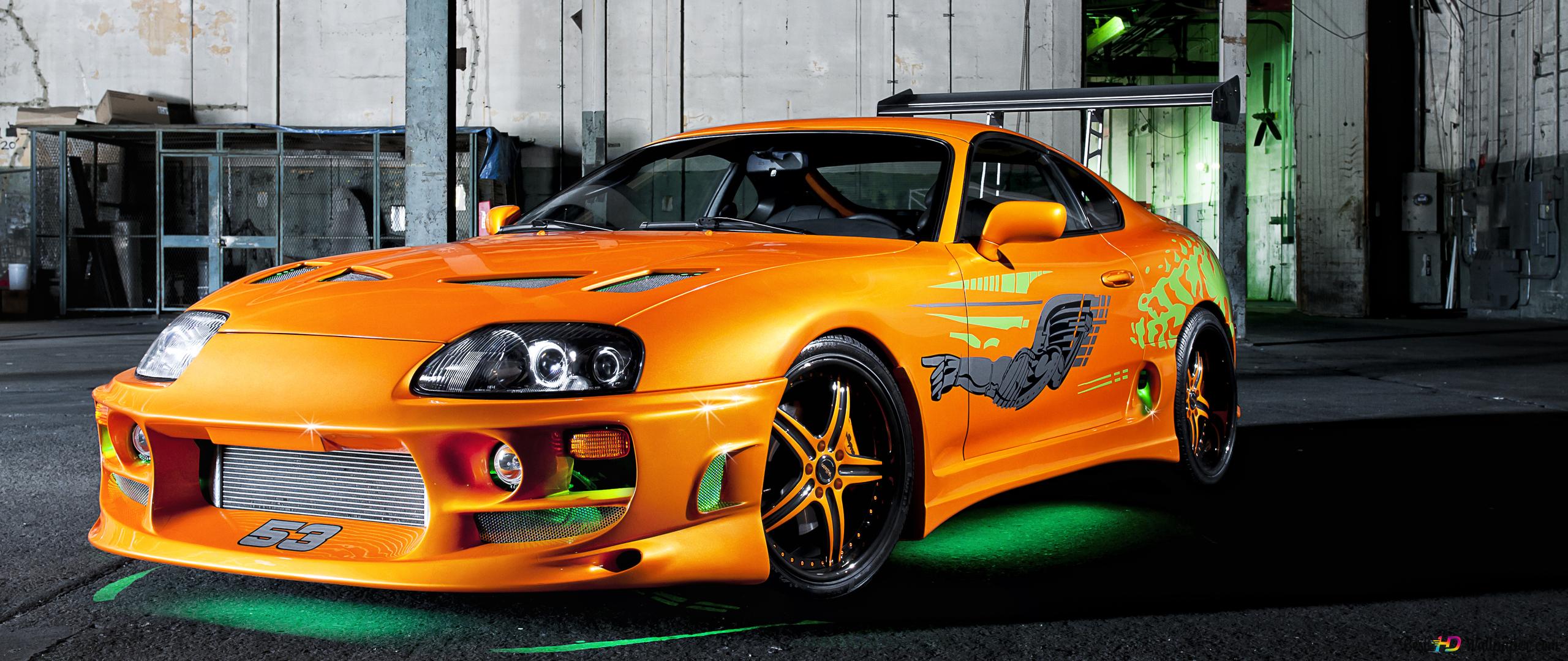 The supra Paul Walker used in Fast and the Furious is in the garage 2K wallpaper download