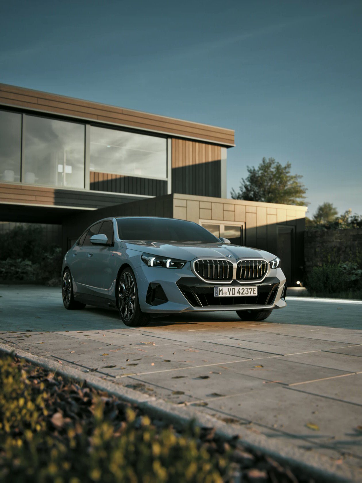 BMW Modern Presence With Familiar Dynamic Character. THE NEW I5. THE NEW #BMW I5 EDrive40​*: Power Consumption 100 Km, CO2 Emission Km, Weighted Comb.: 18.9–15.9 KWh, 0 G. Electric Range: 497–582