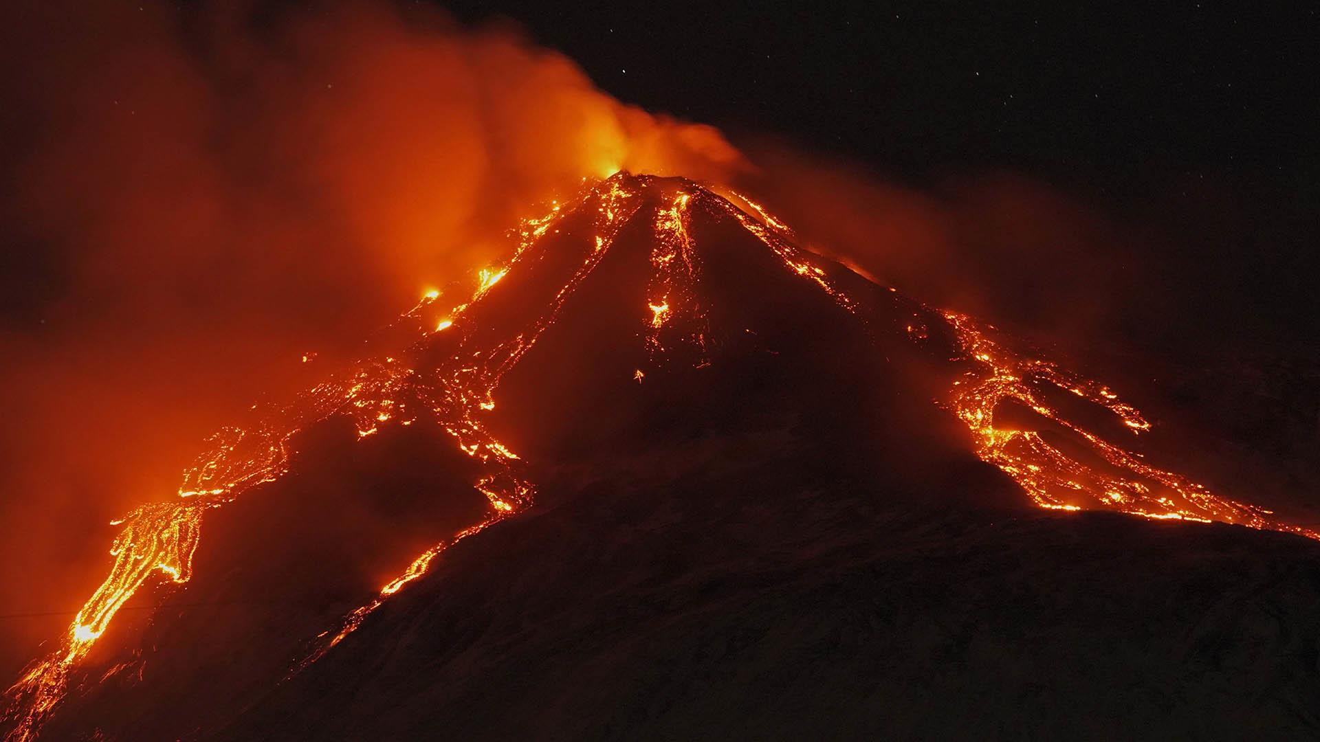 Mount Etna puts on fiery display with nighttime eruption