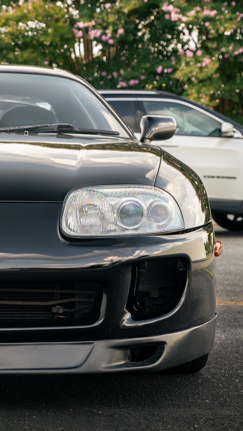 Download Wallpaper 800x1420 Toyota Supra, Toyota, Car, Black, Front View Iphone Se 5s 5c 5 For Parallax HD Background
