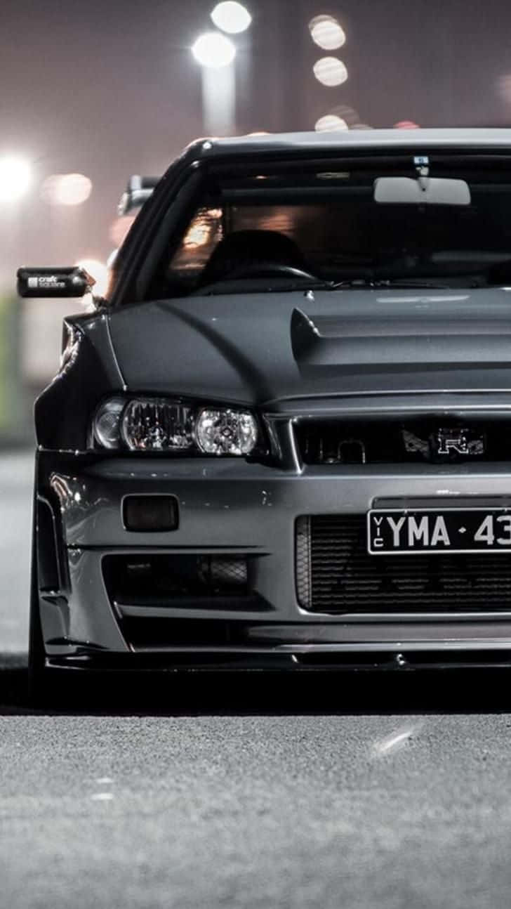 Download Beauty On Wheels Skyline iPhone Wallpaper