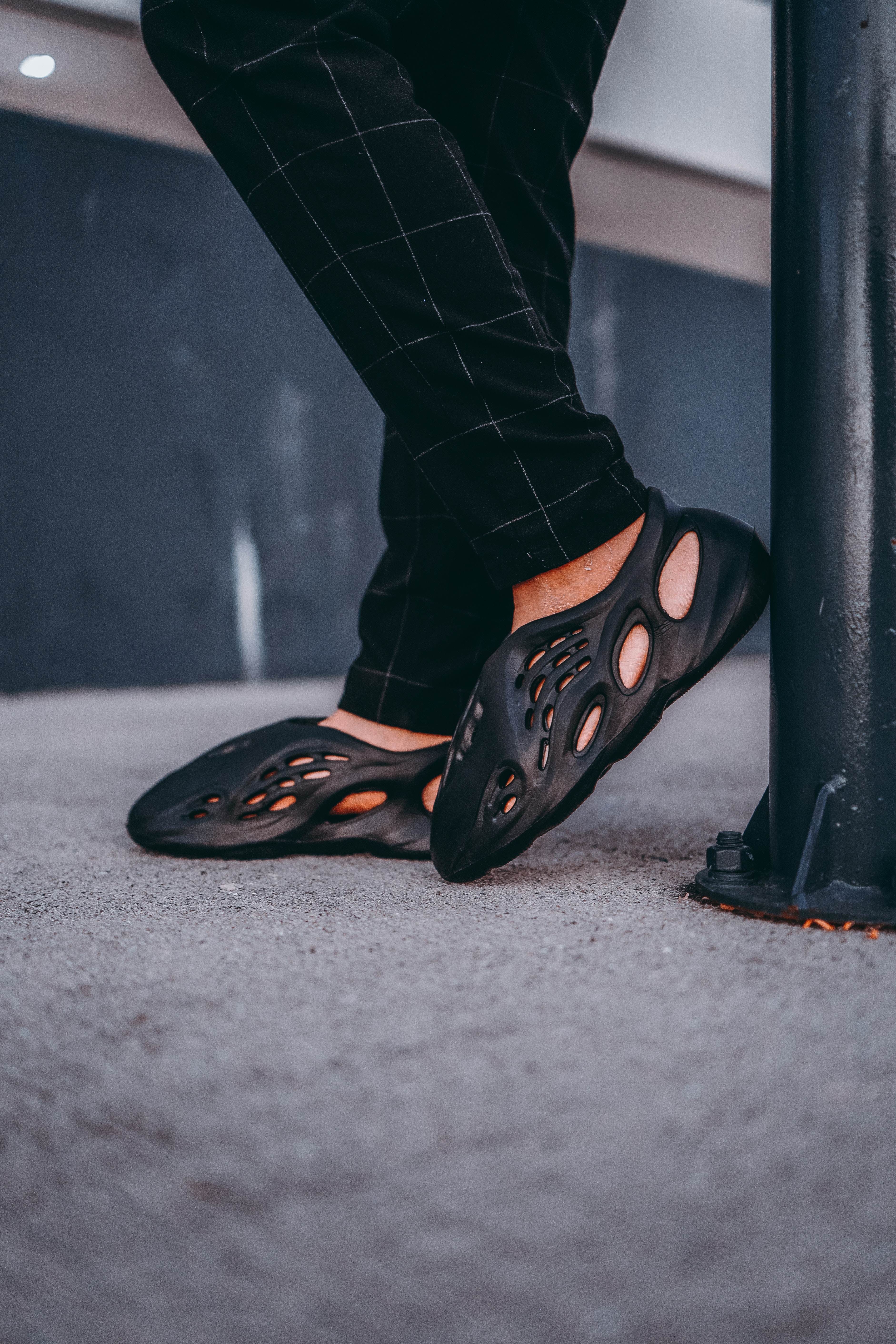 yeezy foam runner on feet black