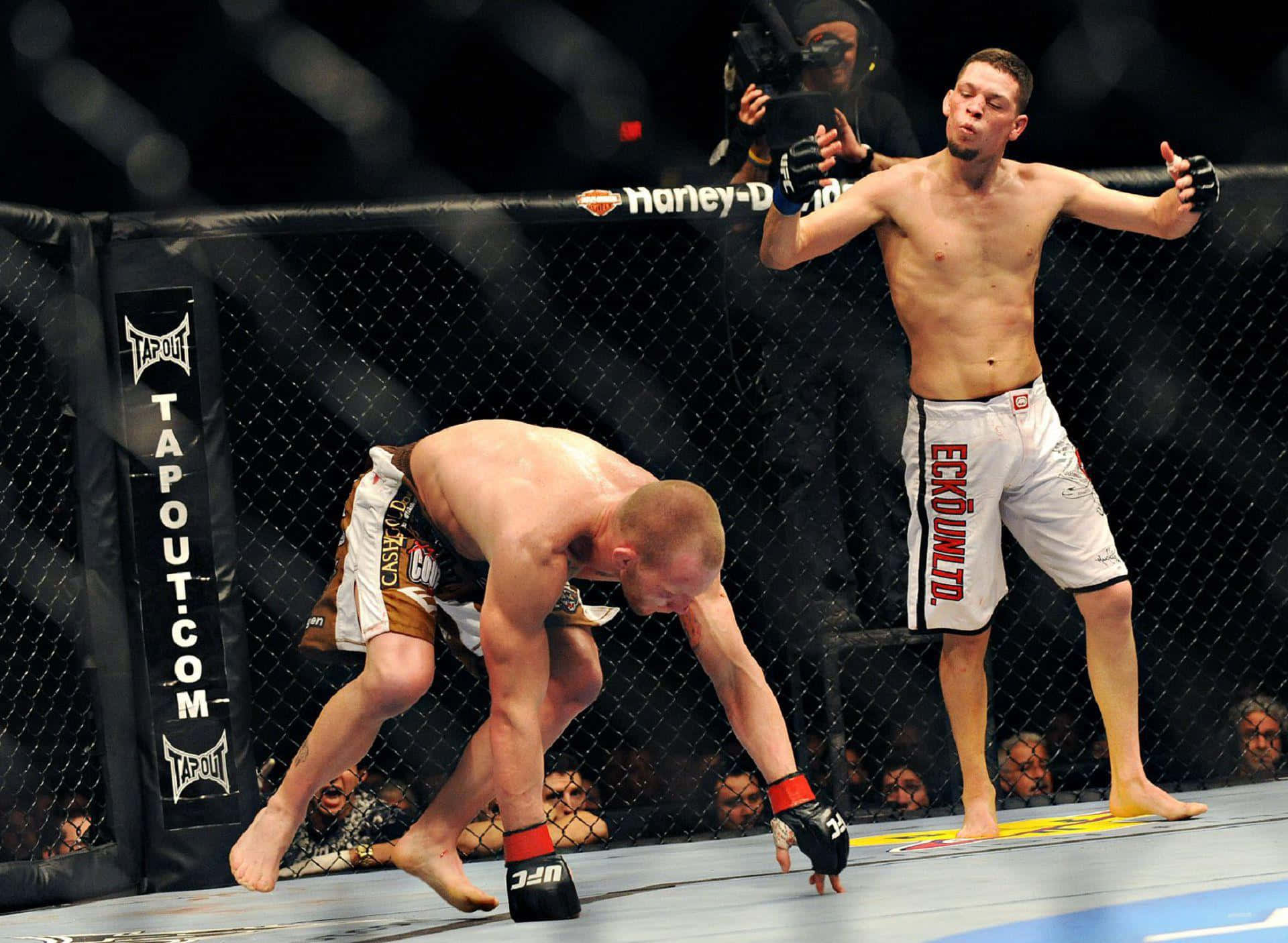 Download Nate Diaz Taunting Gray Maynard Ufc Fight Night 20 Wallpaper