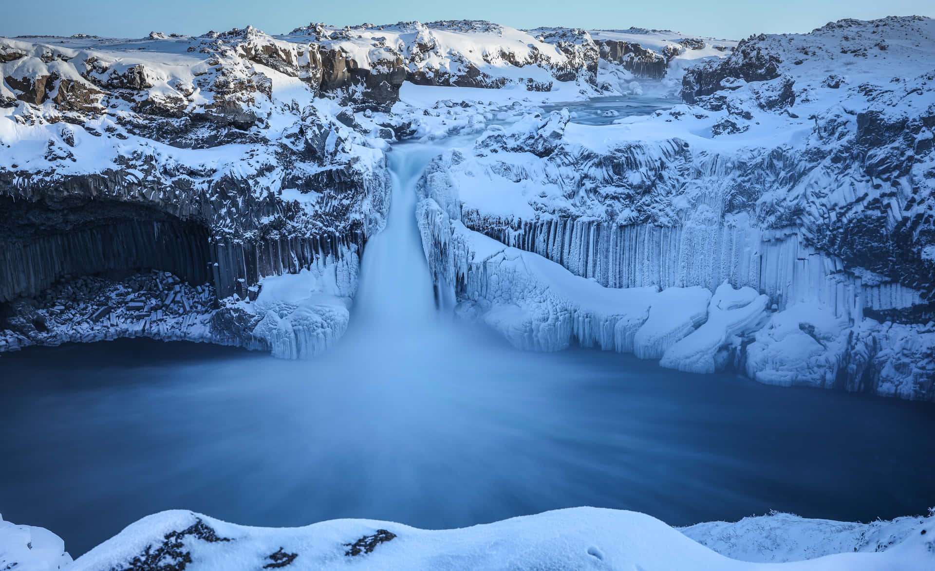 Download Snowy Waterfall In Iceland Wallpaper