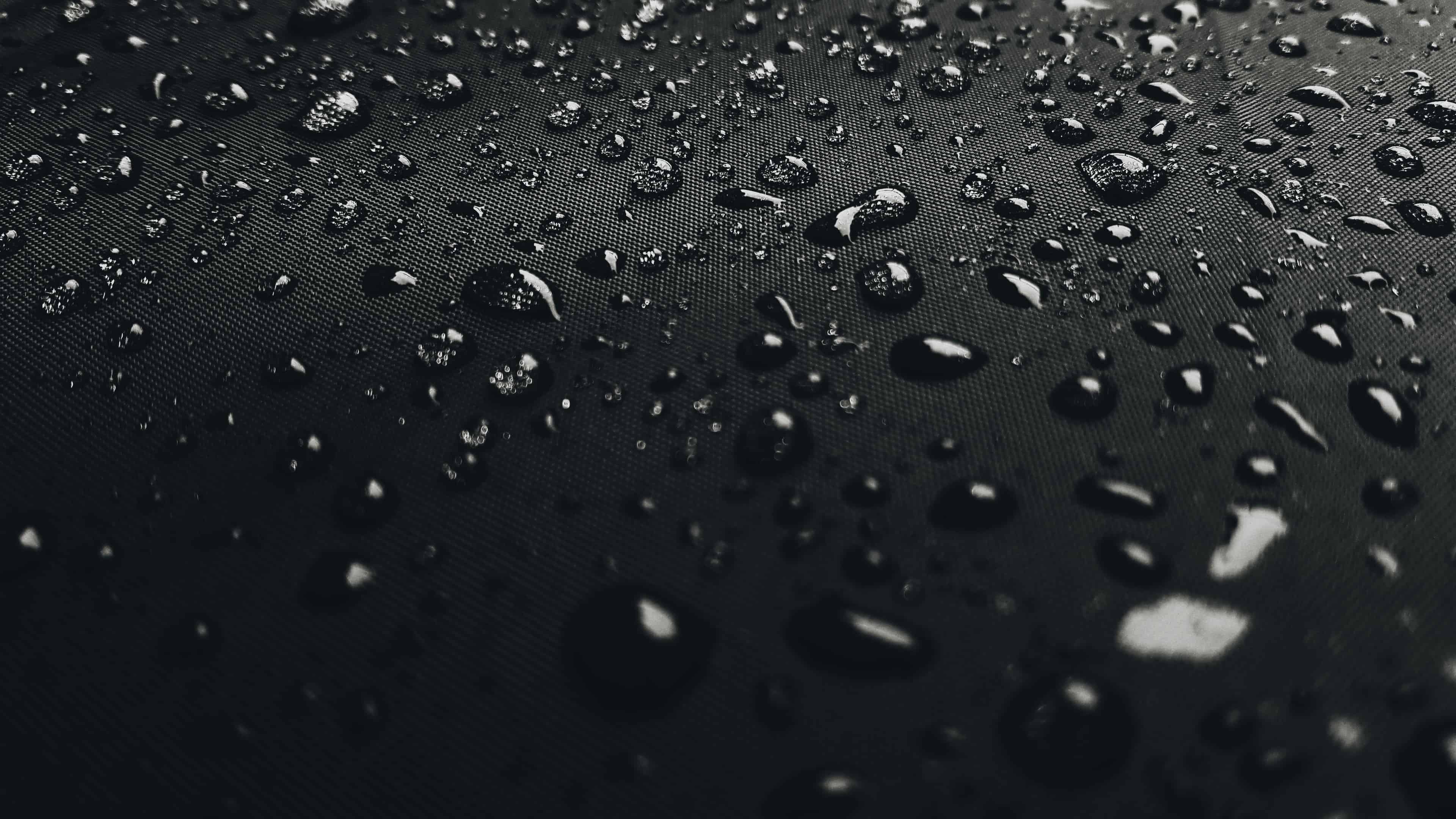 Water Drops On Black Surface UHD 4K