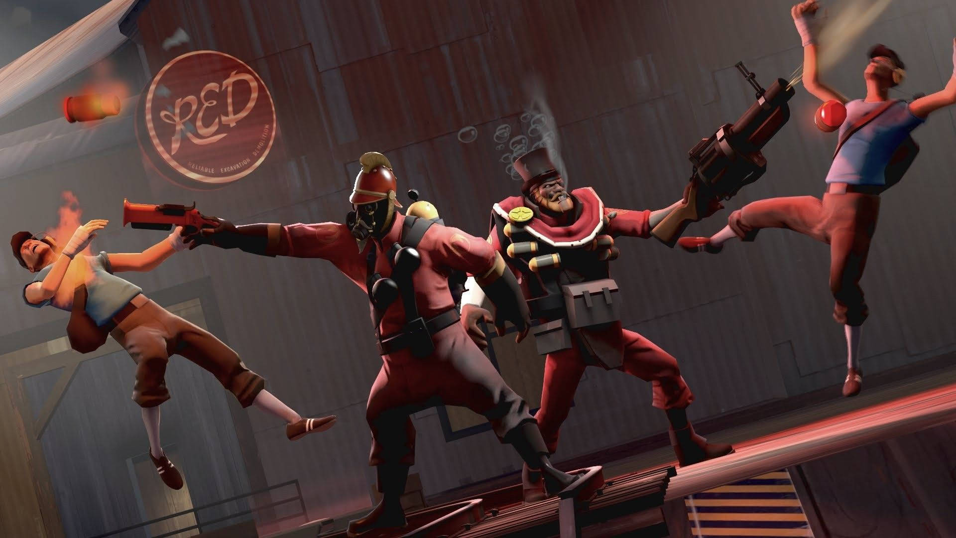 Download Stunning action shot of Demoman and Pyro from Team Fortress 2 Wallpaper