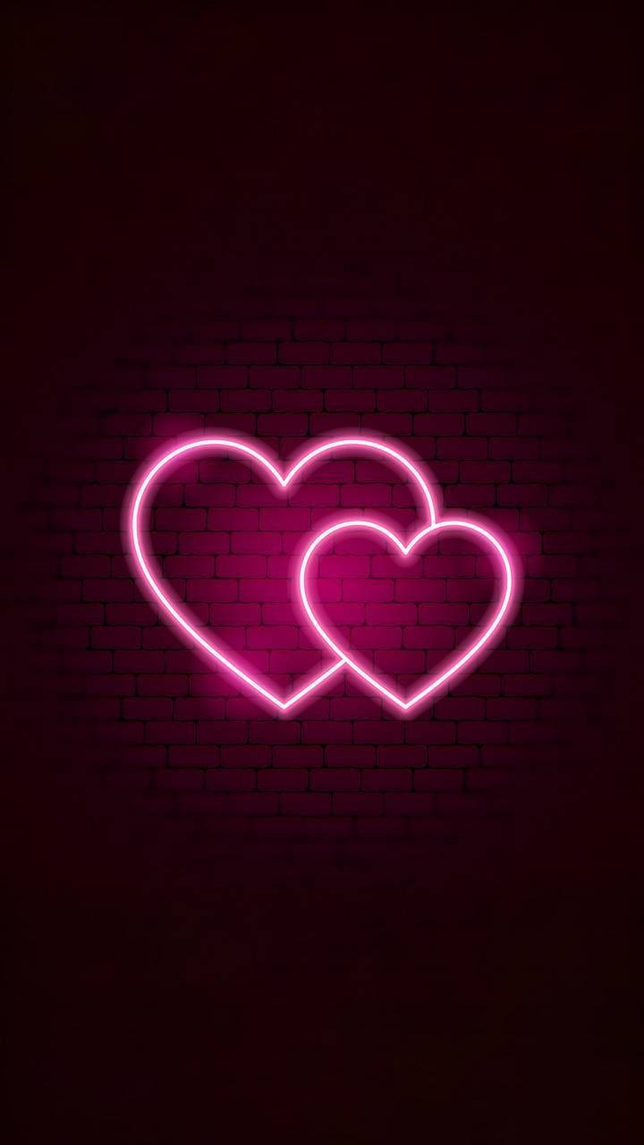 Download Aesthetic Pink iPhone Two Neon Hearts Wallpaper