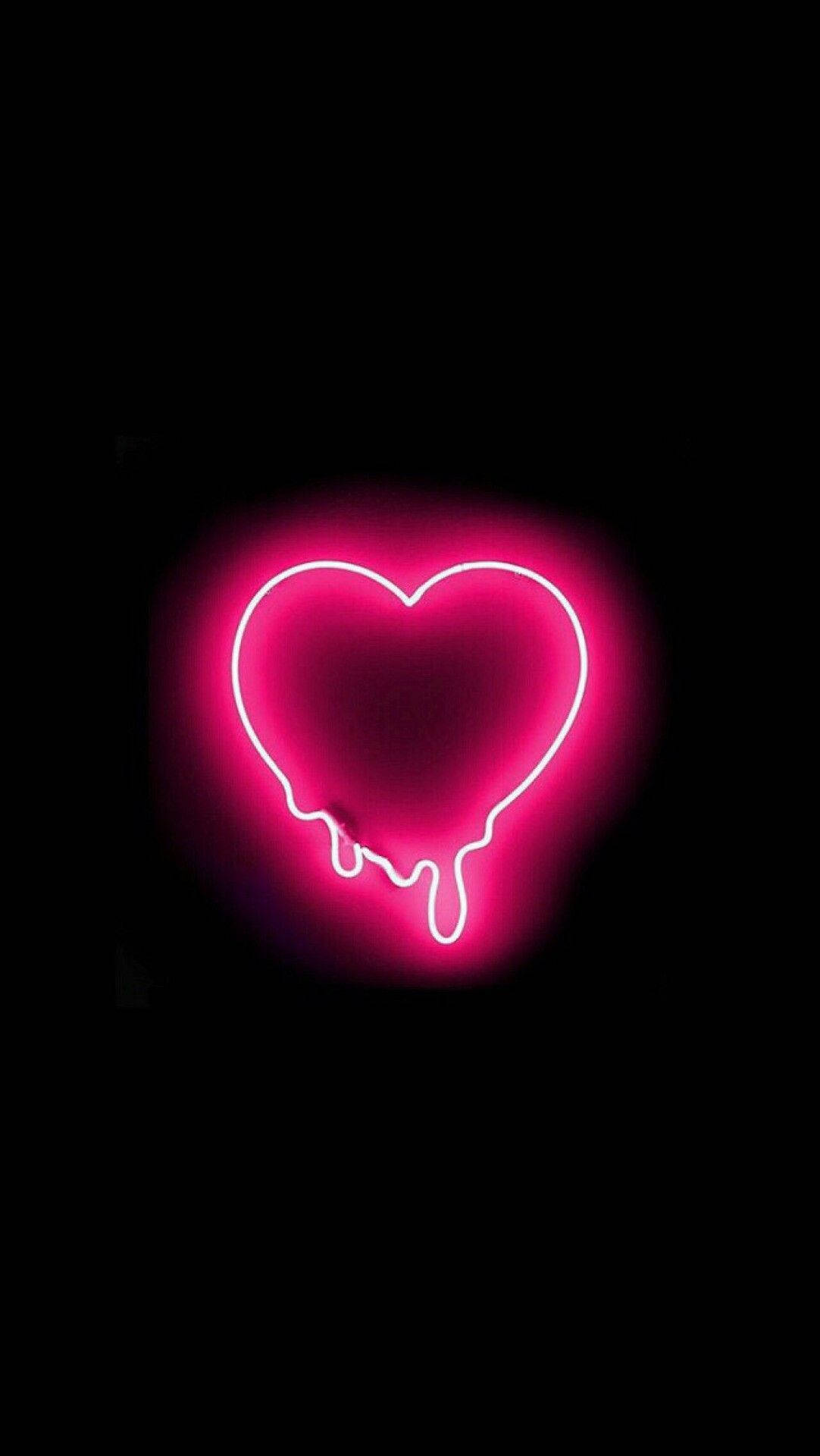 Download A Pink Neon Heart With Dripping Blood On It Wallpaper