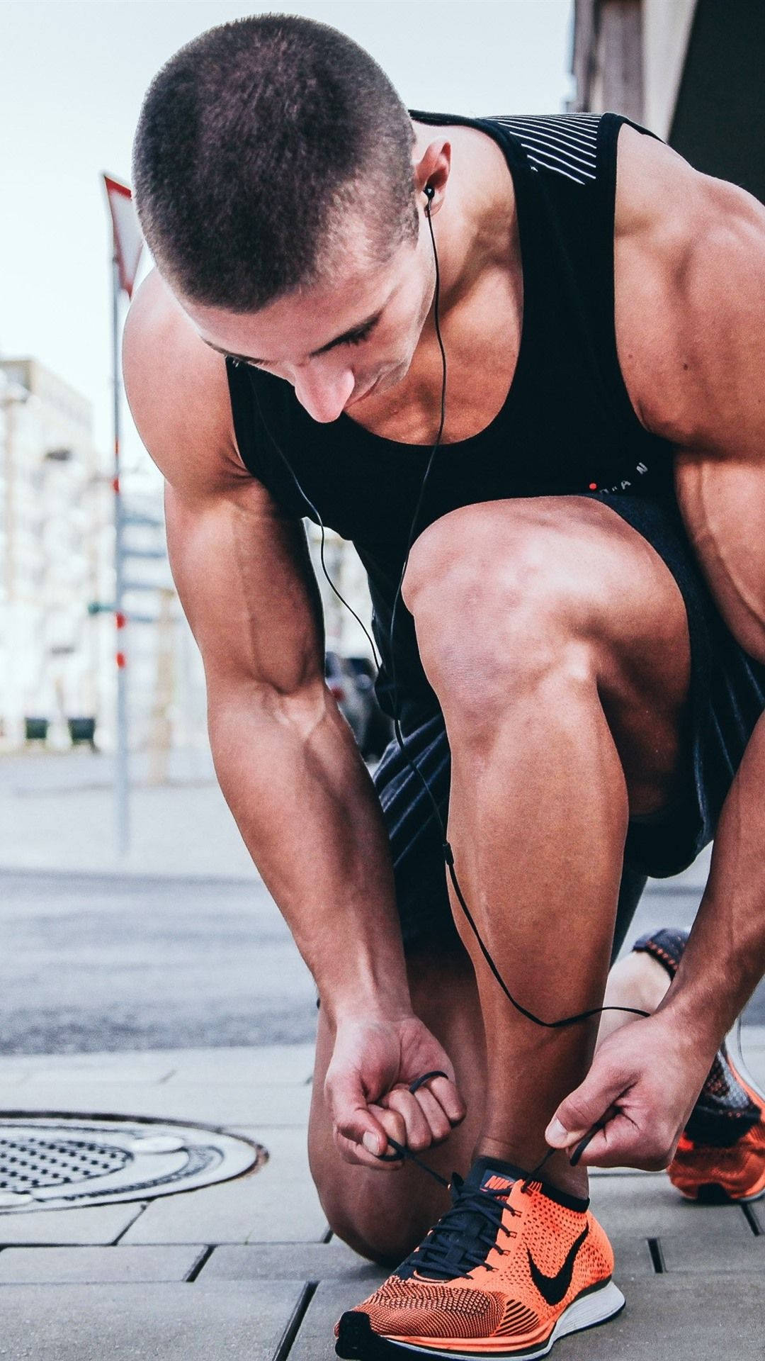 Download Man In Athletic Wear Wallpaper