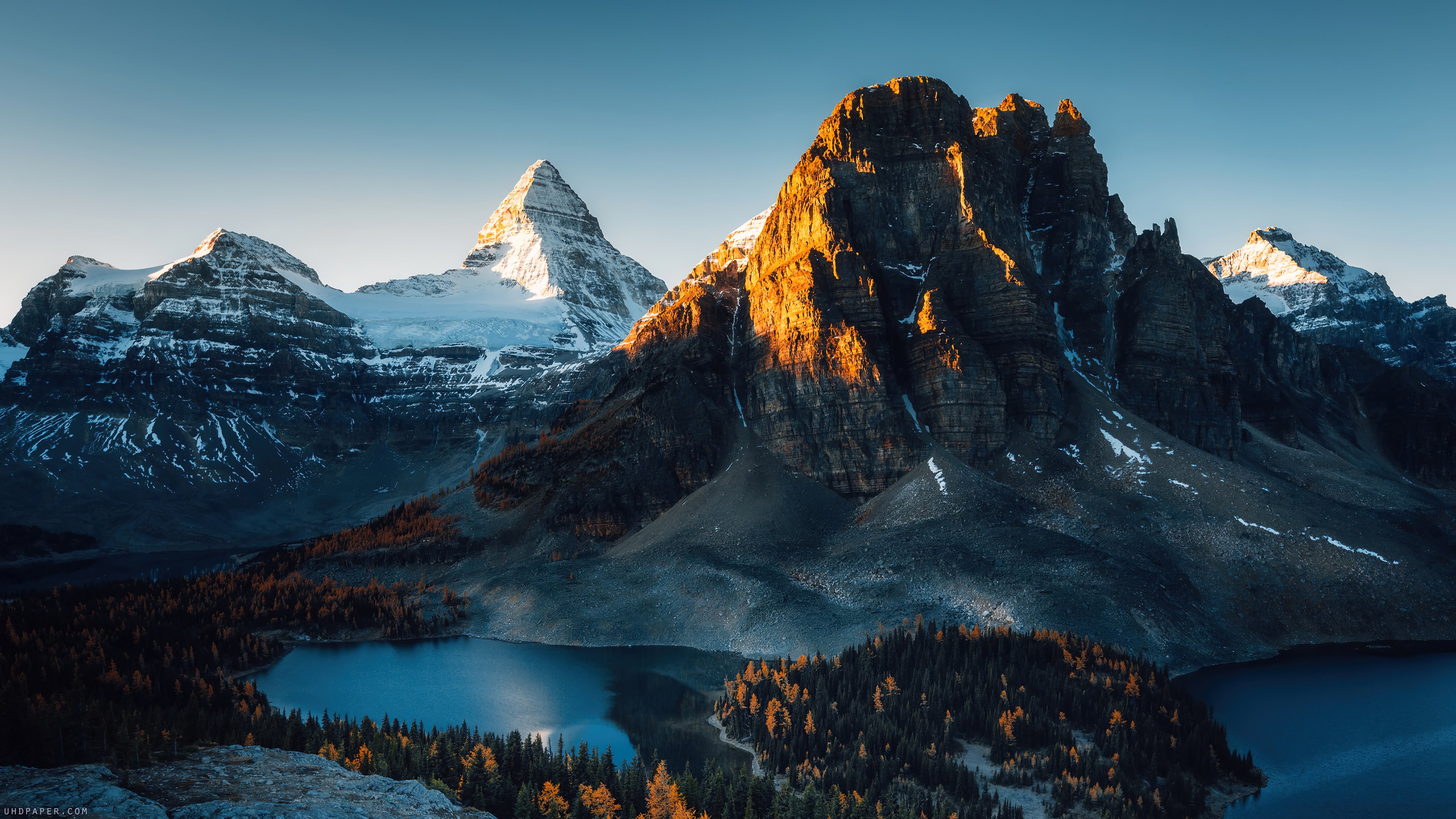 Snowy mountains in the forest Wallpaper 4k for Desktop