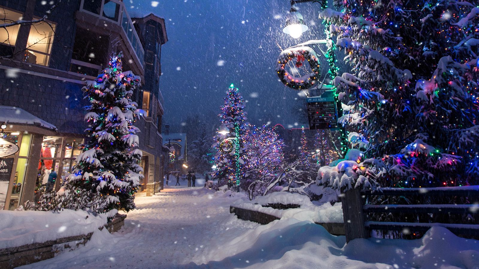 Download wallpaper 1600x900 christmas, new year, winter, street, snowfall, mood widescreen 16:9 HD background