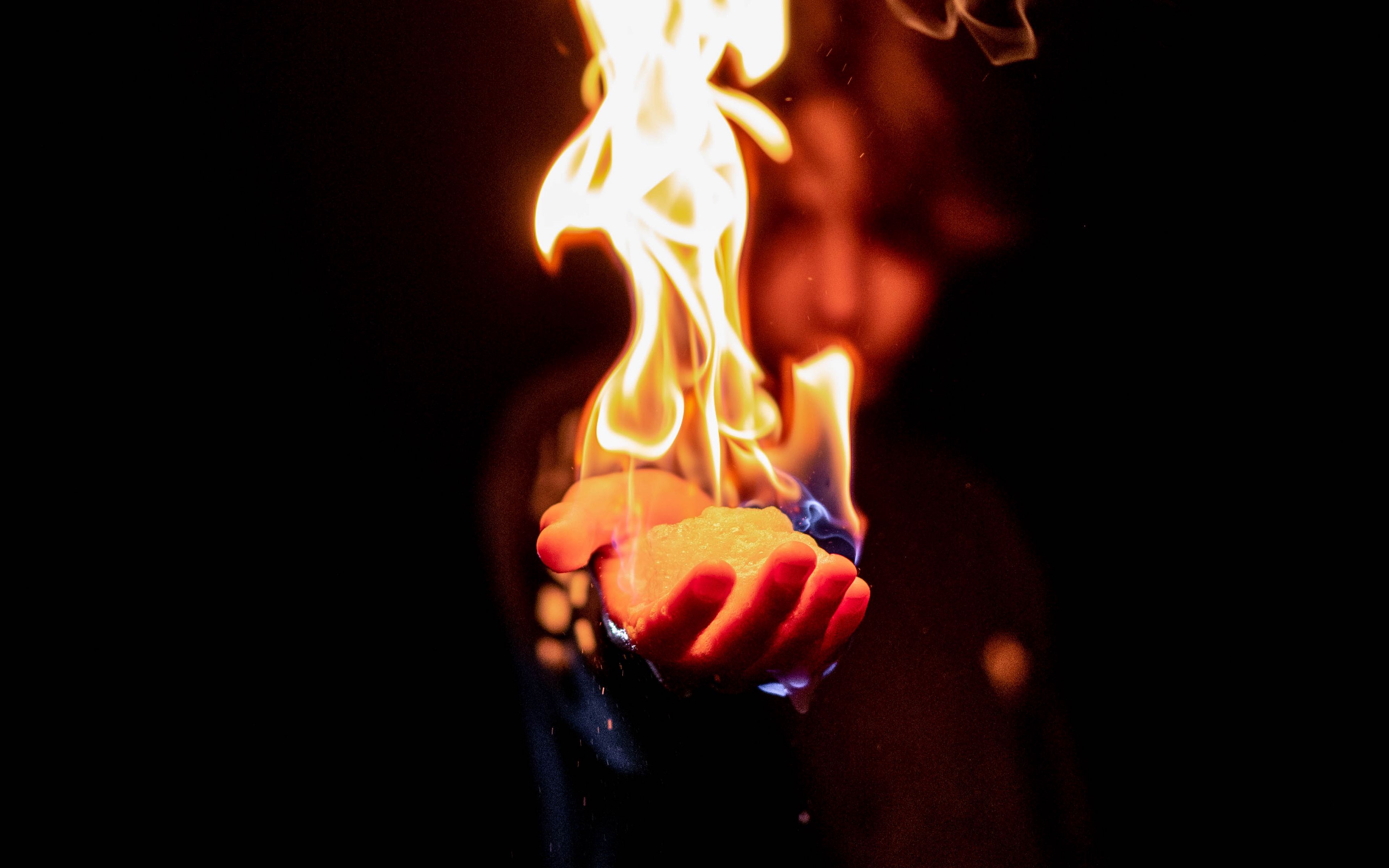Download wallpaper 3840x2400 flame, fire, hand, man, dark 4k ultra HD 16:10 HD background