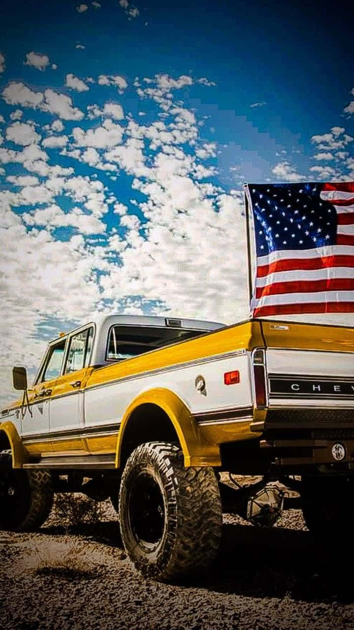 Download Yellow Jacked Up Trucks With White Stripe Wallpaper