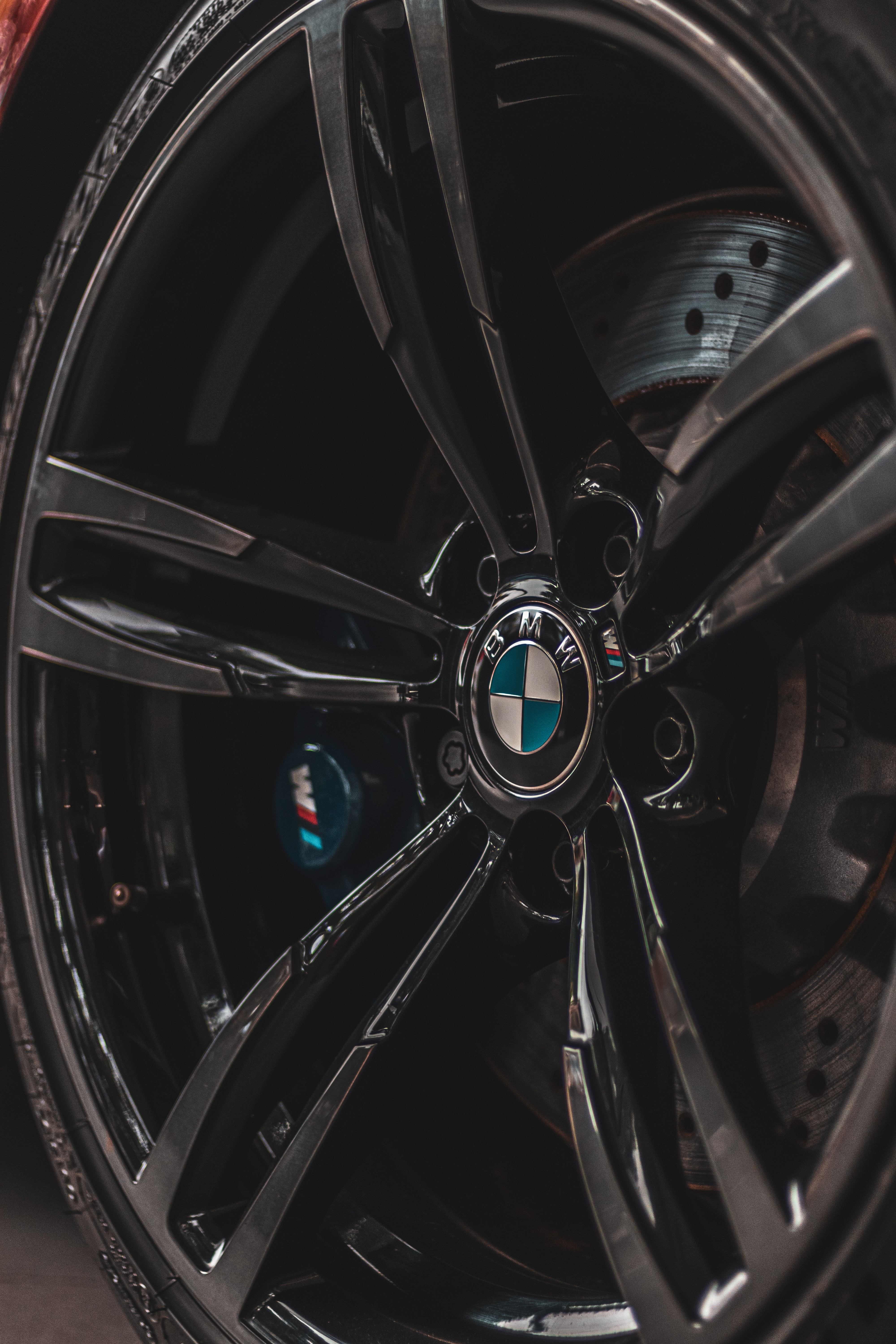 Close Up Photo of a Black Bmw Steering Wheel · Free